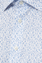 قميص تويل مميز للماركة بلون أبيض ونقشة زهور