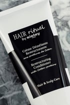 بلسم هير ريتويل لإصلاح الشعر ببروتينات القطن