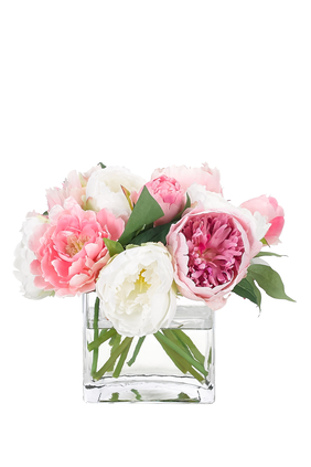 باقة زهور فاوانيا وورود في مزهرية زجاج