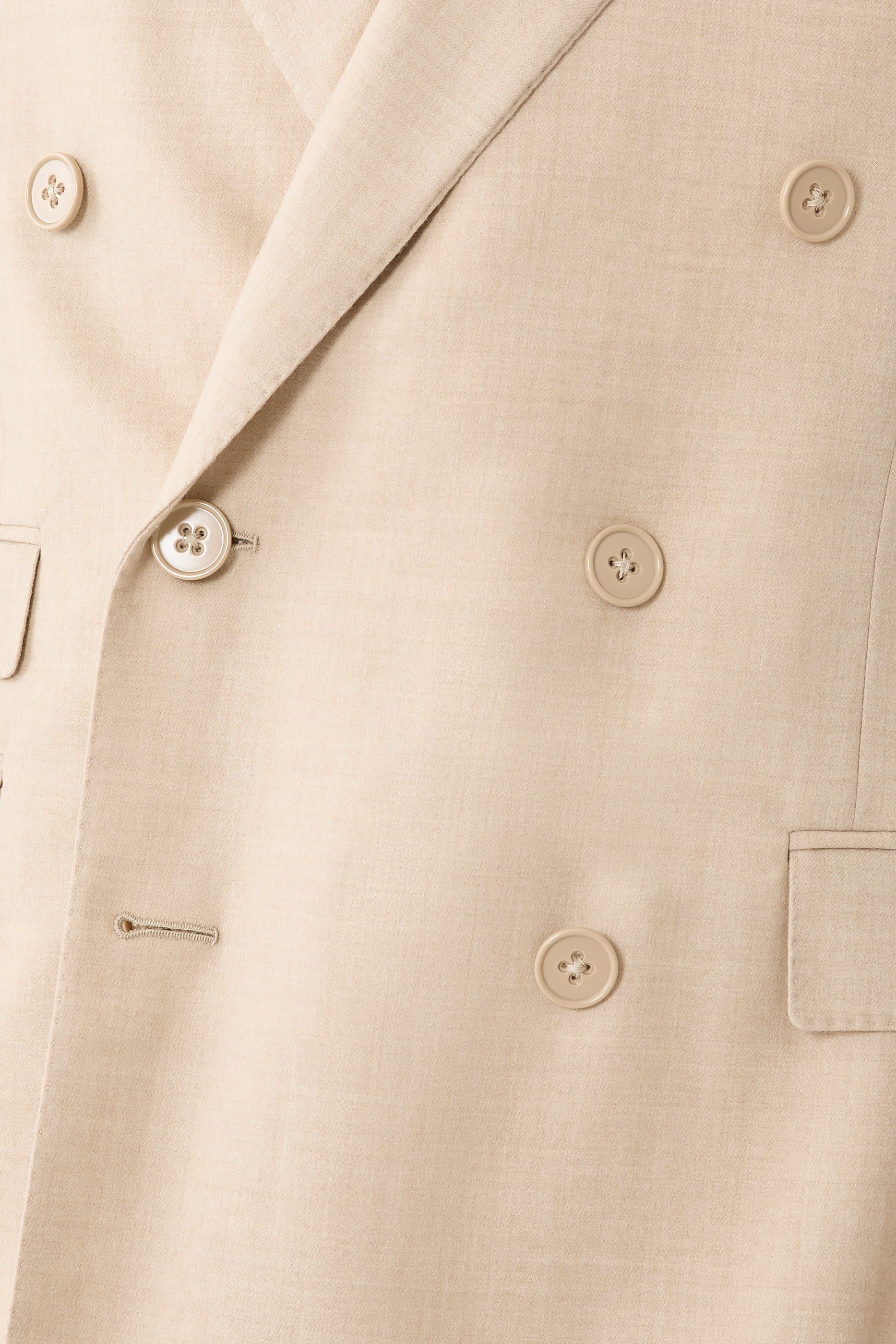 جاكيت كينت بنقشة مربعات بخياطة يدوية صوف