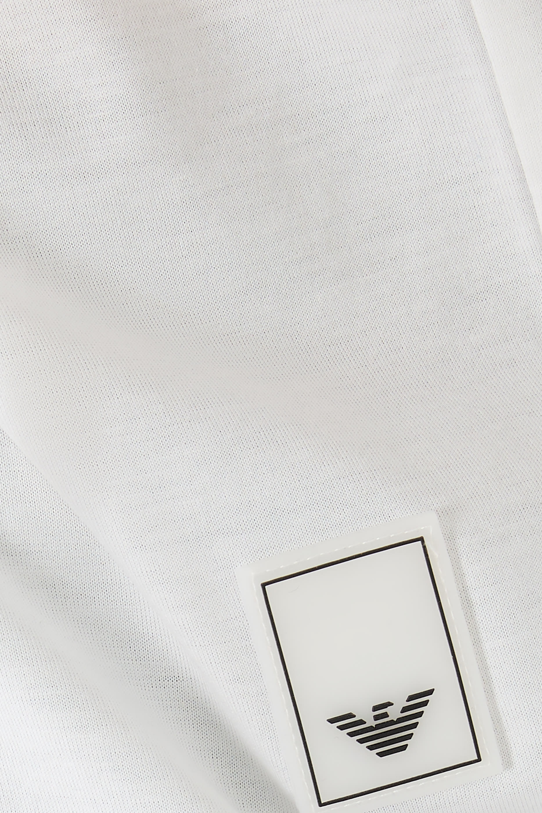 قميص بولو برقعة شعار رأس النسر صغيرة