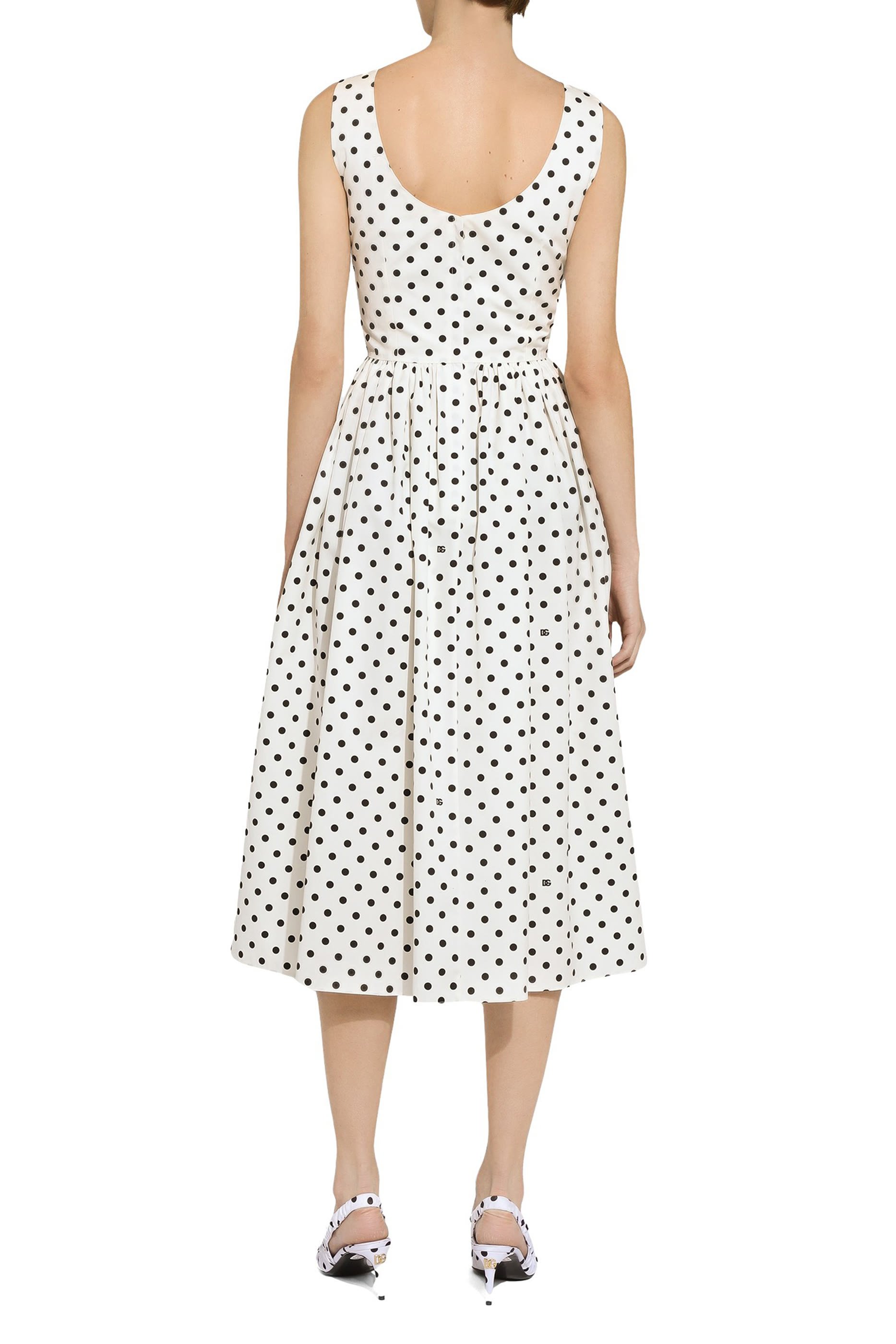 فستان بنقشة نقاط بولكا وقصة مستديرة