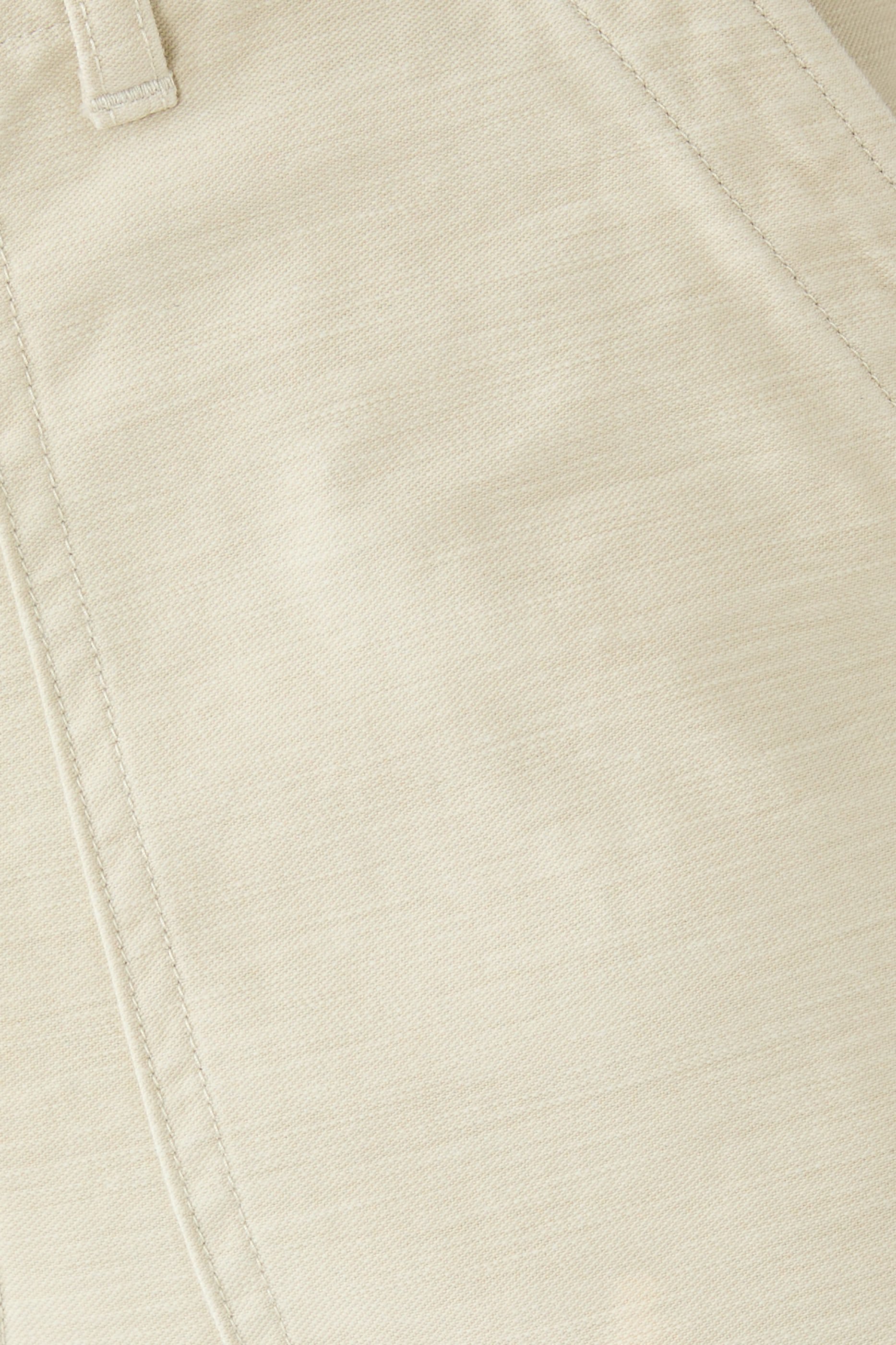 بنطال بيكر باغي بتأثير مبيض ساتان