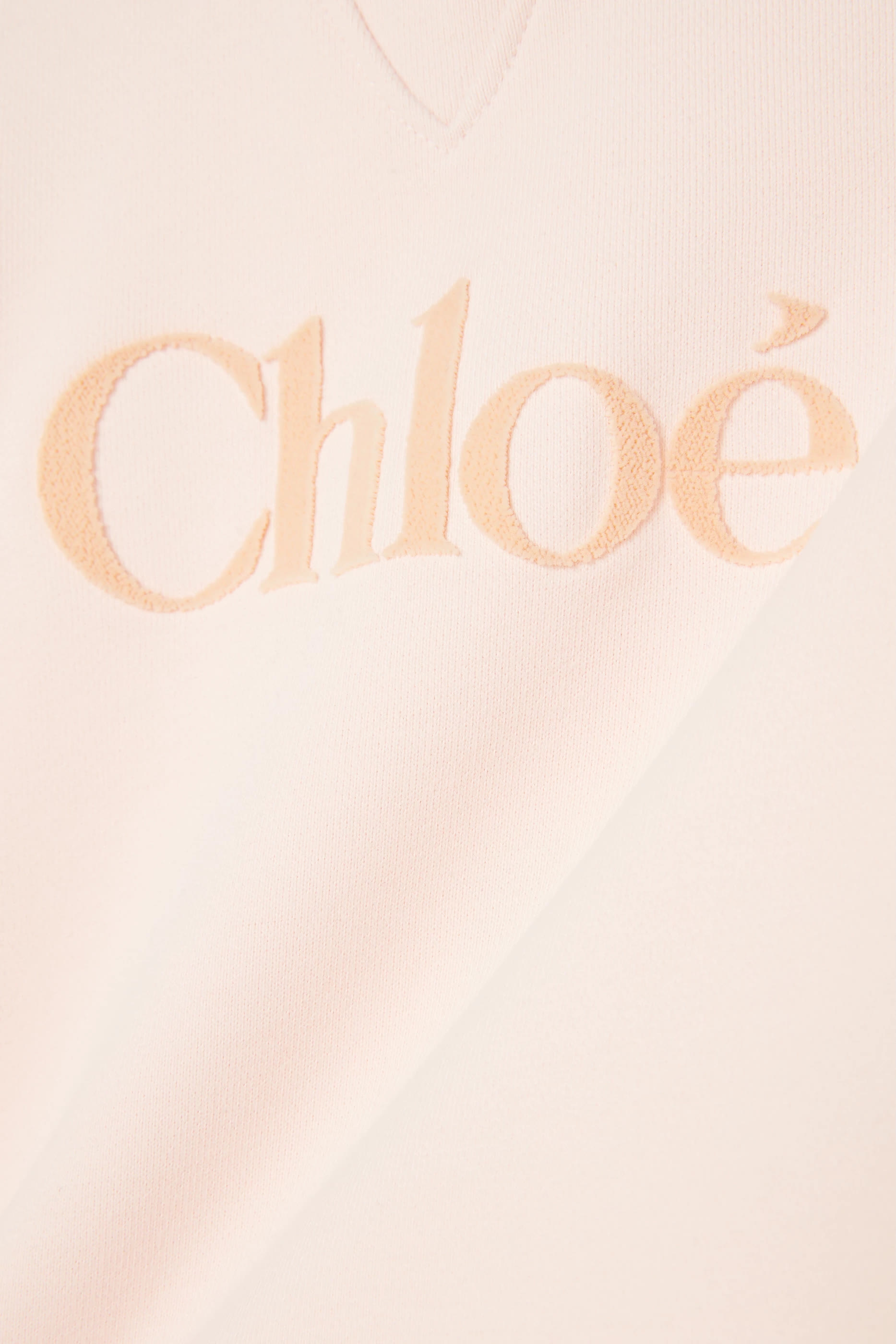 كنزة بشعار الماركة للأطفال