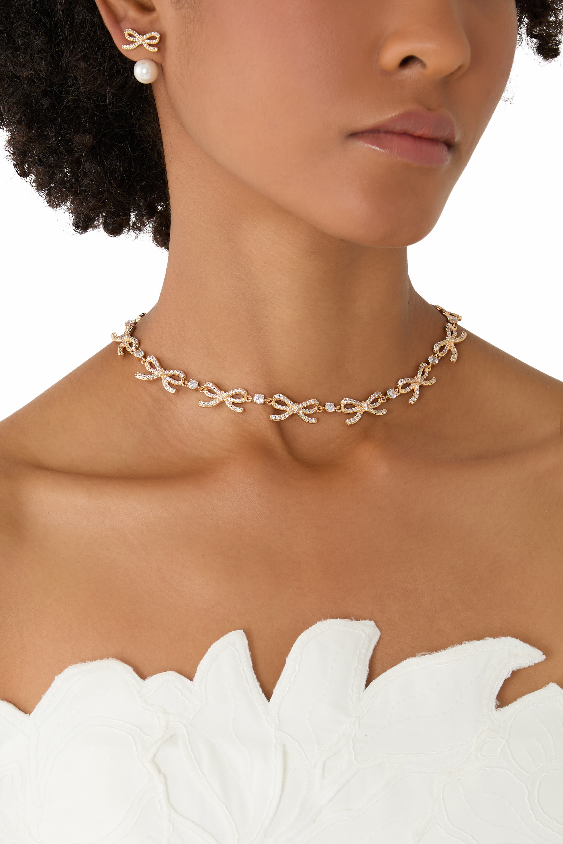 أقراط جاكيت مزينة بفيونكة ولؤلؤ