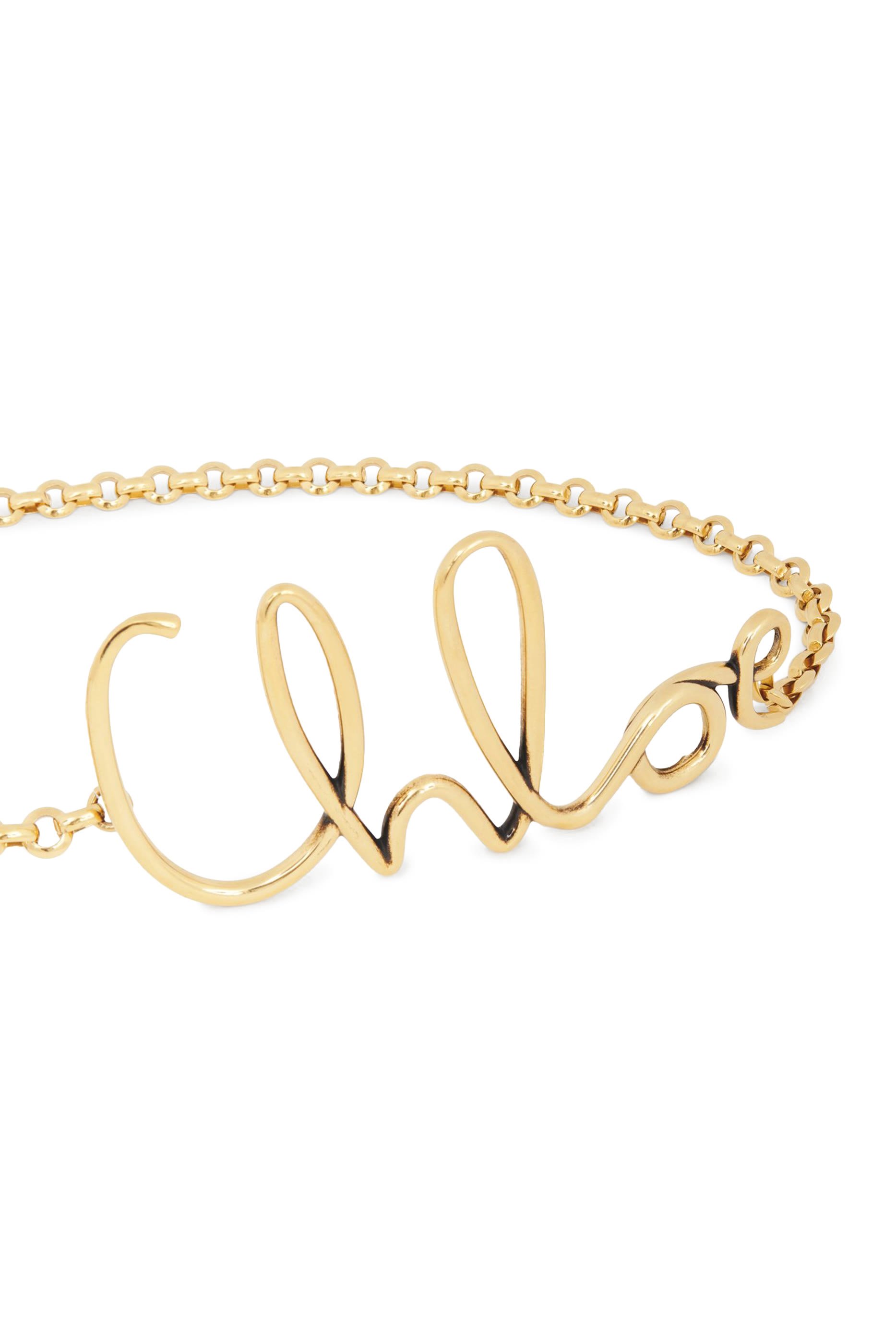 حزام بشعار الماركة الشهير