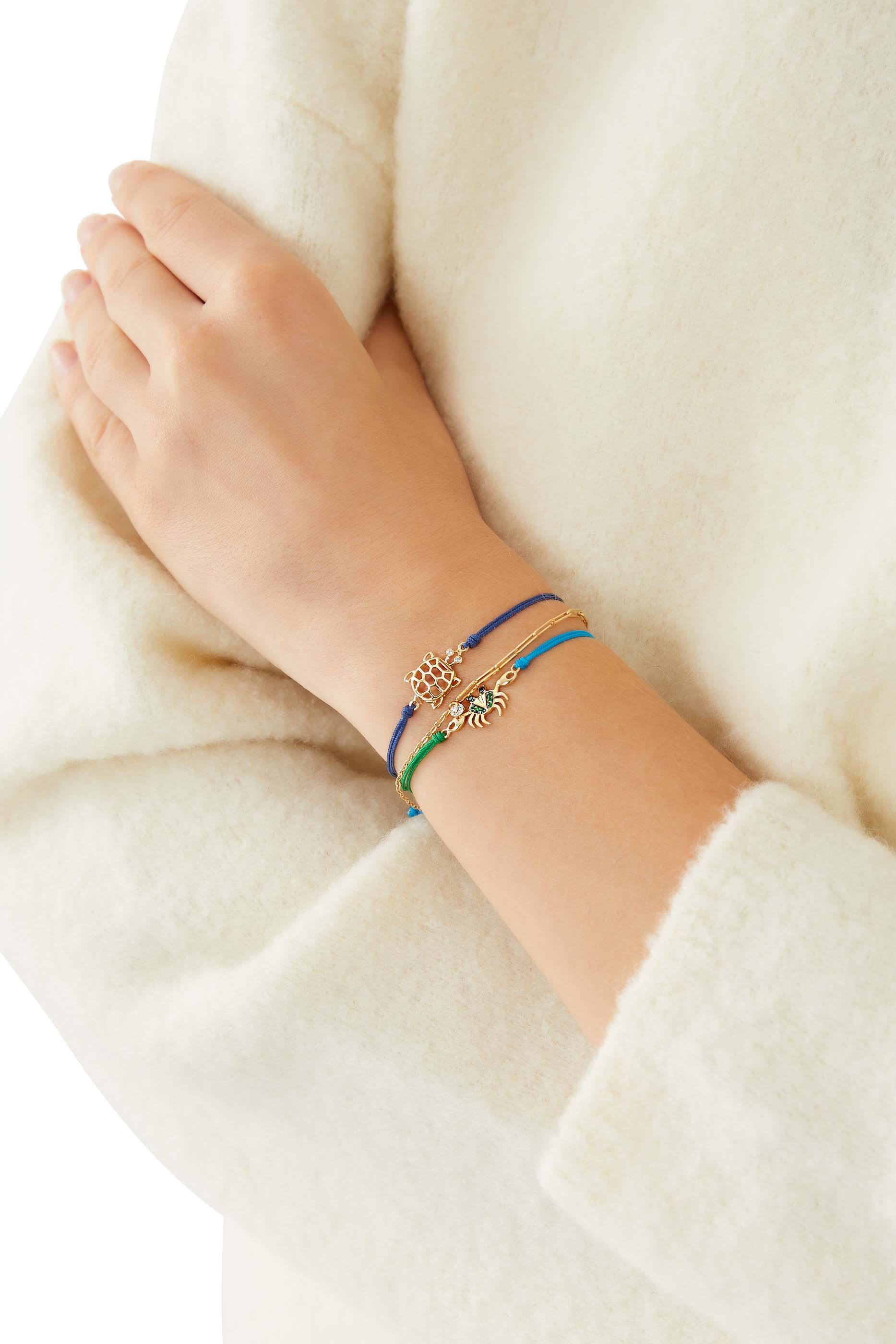 سوار بخيط بحلية سلطعون مرصعة بالماس والتسافوريت ذهب أصفر عيار 9