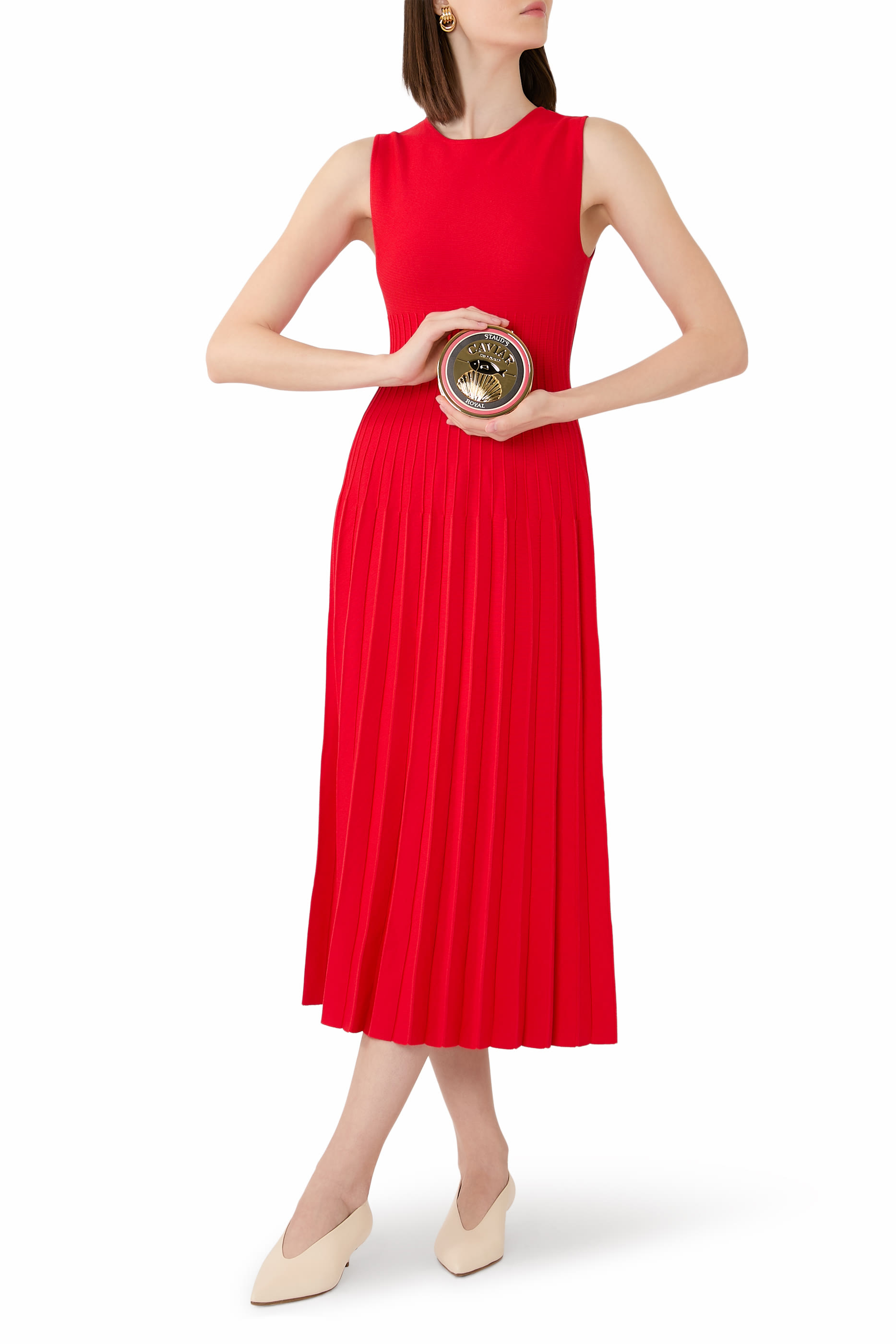 كلاتش بتصميم علبة كافيار معدنية