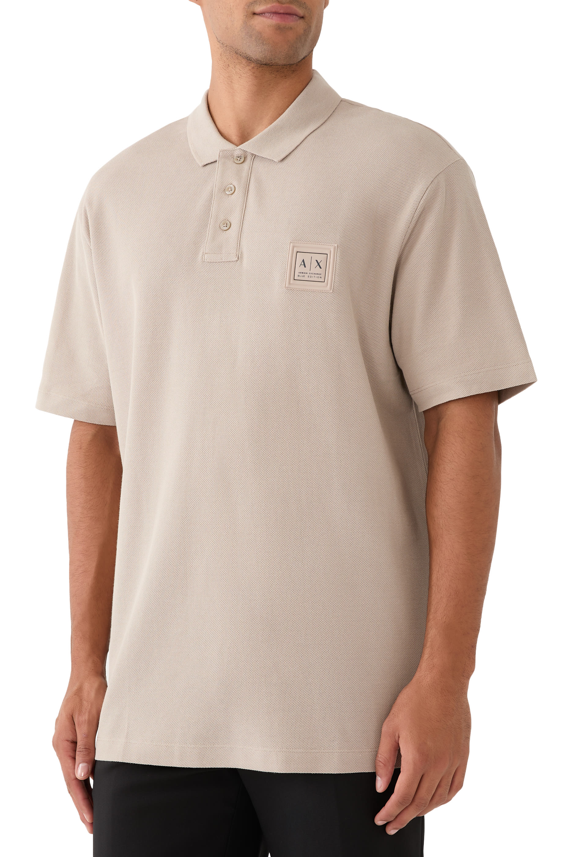 قميص بولو بنصف سحاب بشعار الماركة