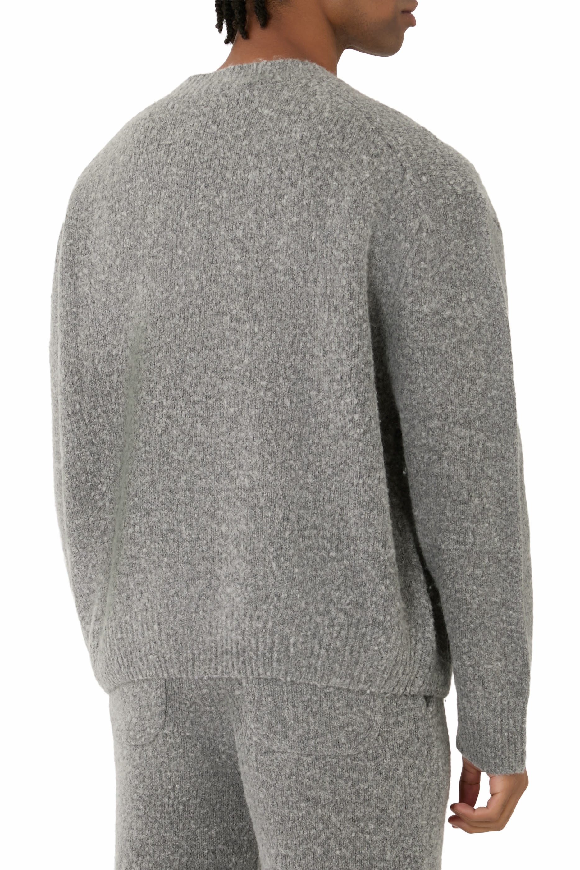 سترة منسوجة بشعار الماركة