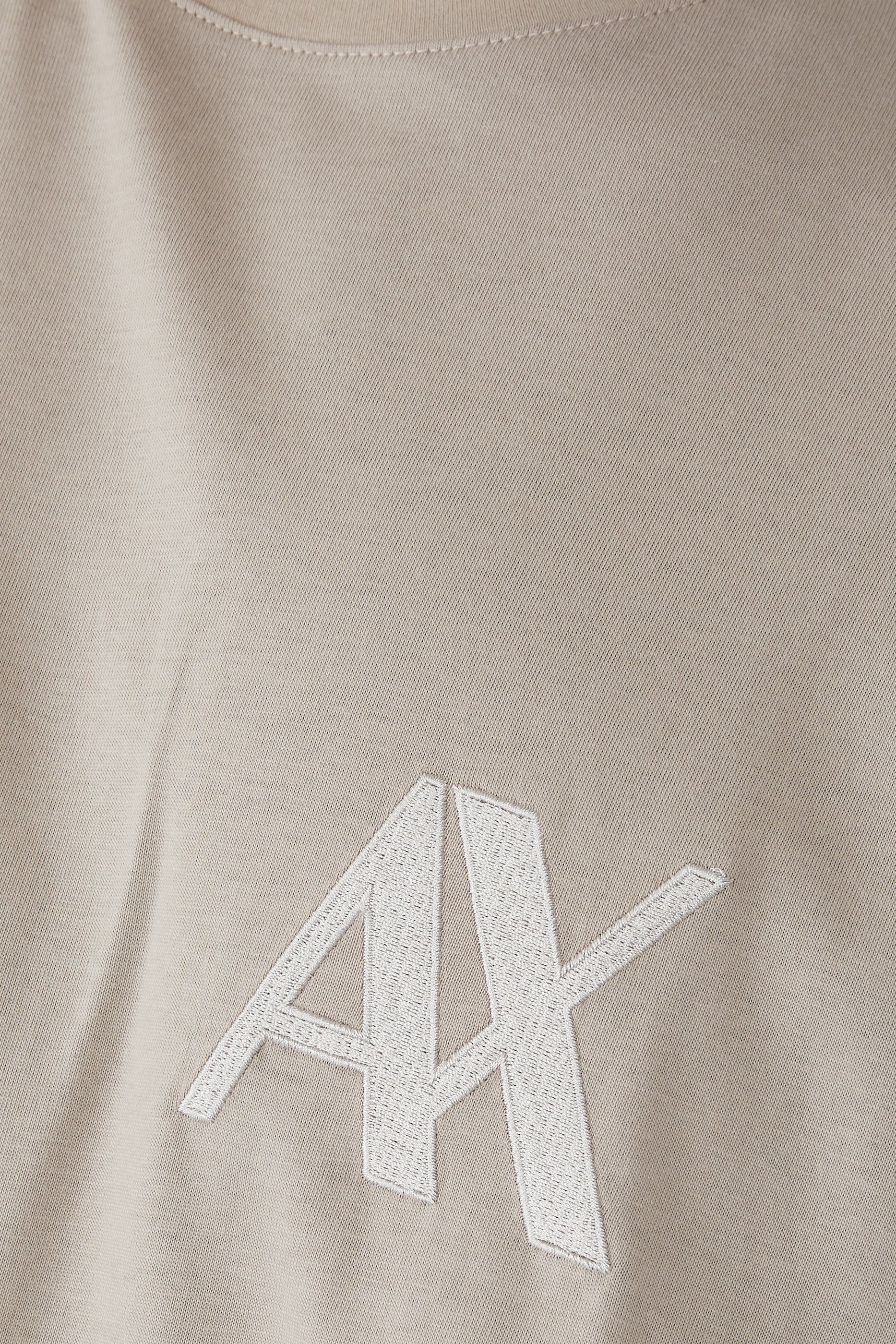 تيشيرت ذا جمنازيوم بياقة ضيقة