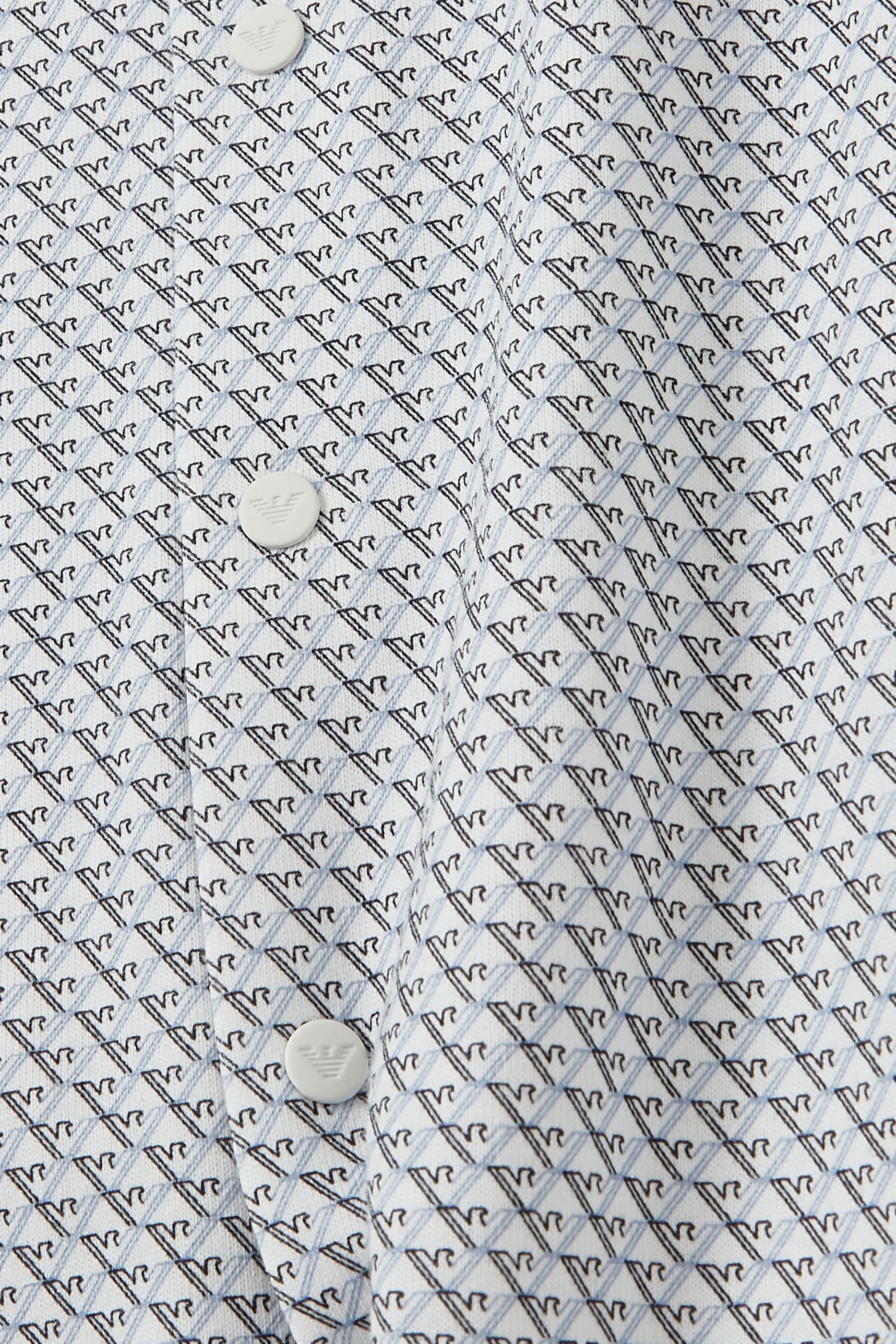 بدلة كحلي من مجموعة إيسانشيل كابسل