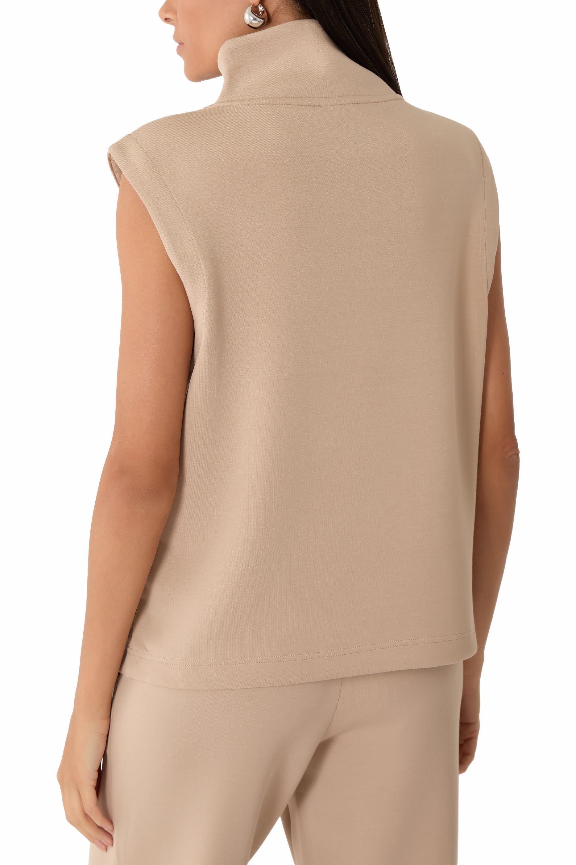 بلوزة ماغنوليا 2.0 بلا أكمام بنصف سحاب