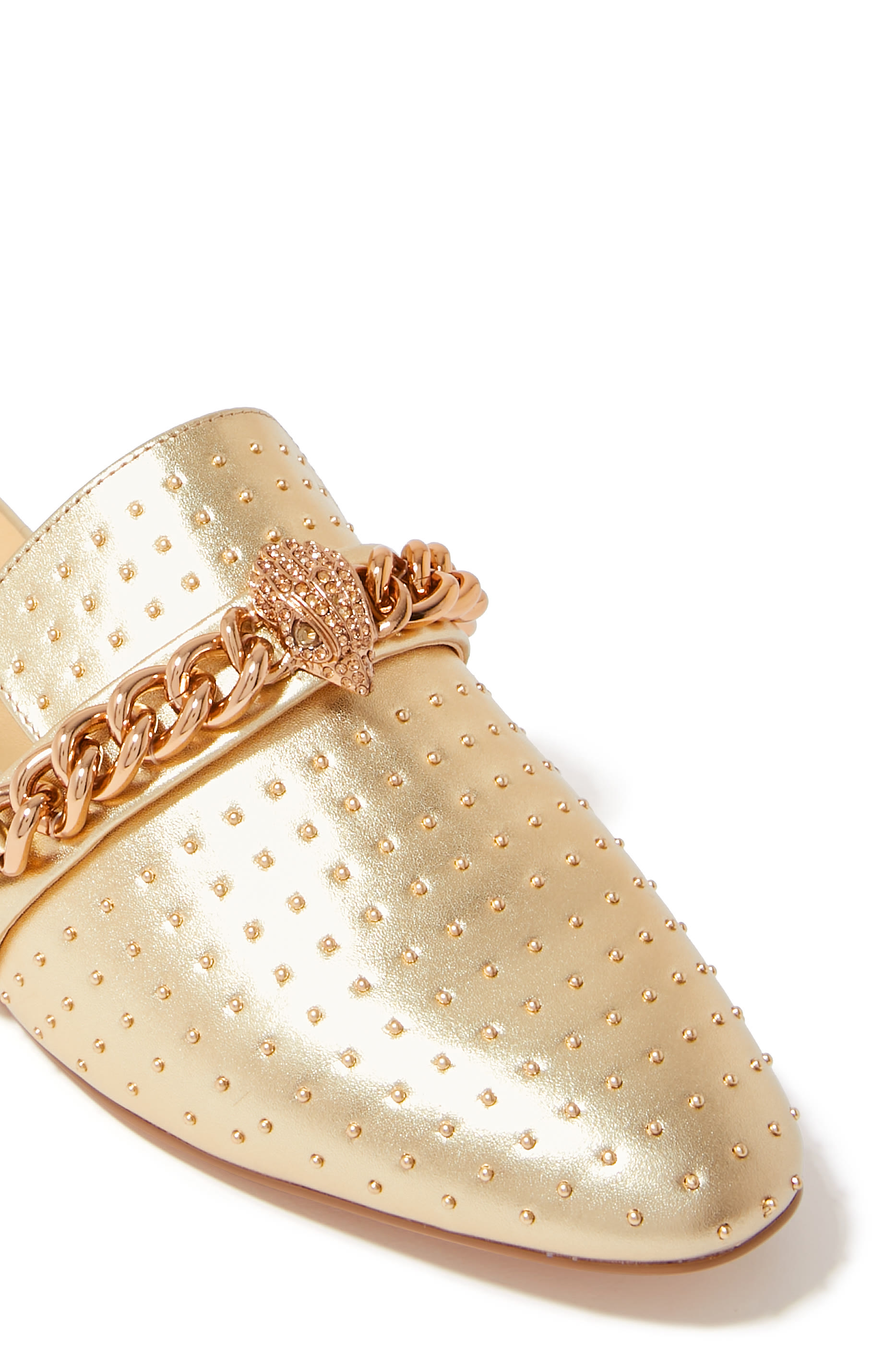 حذاء تشيلسي مفتوح من الخلف بكعب مسطح وحلي