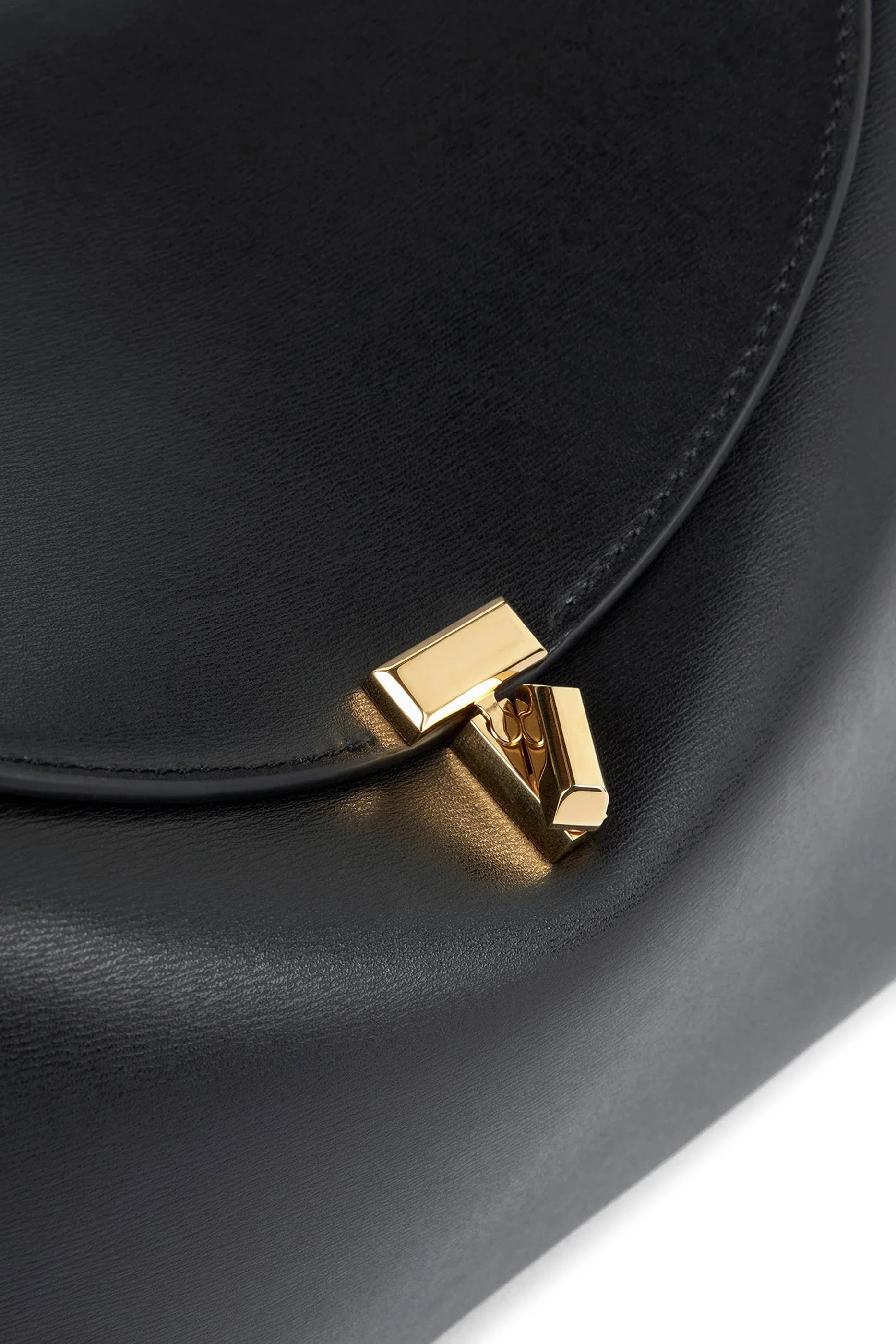 حقيبة بقفل بتصميم حرف T ويد علوية جلد