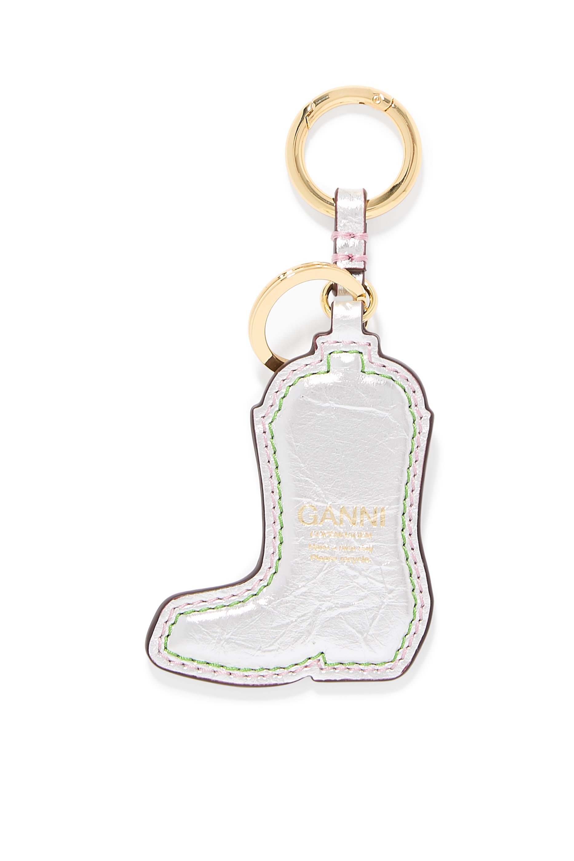 سلسلة مفاتيح على شكل بوت بتصميم غربي