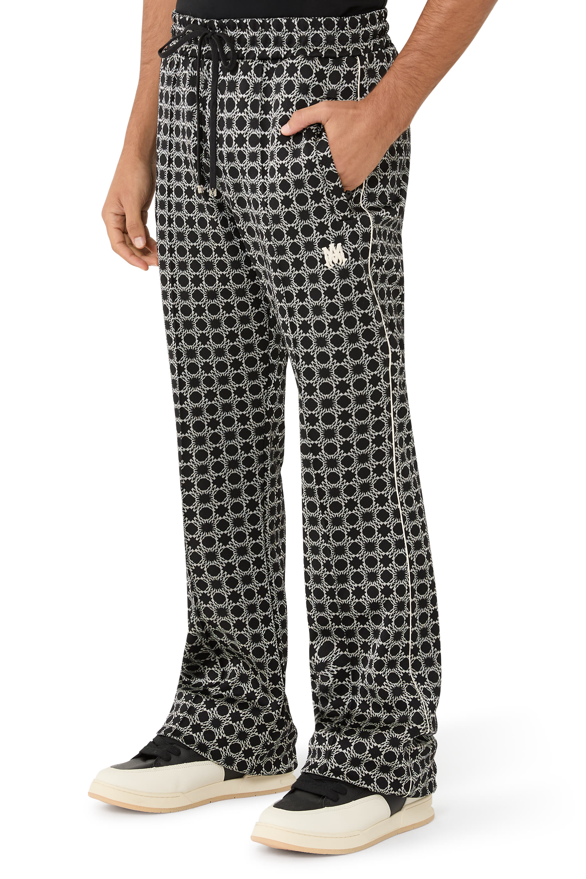 بنطال رياضي كواد بحافة واسعة وحرفي شعار الماركة