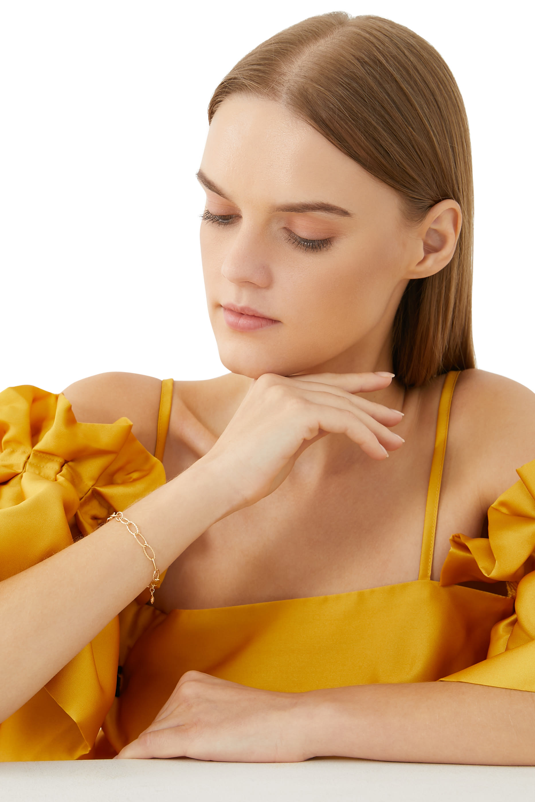 سوار بتصميم حلقات بيضاوية ذهب أصفر عيار 18