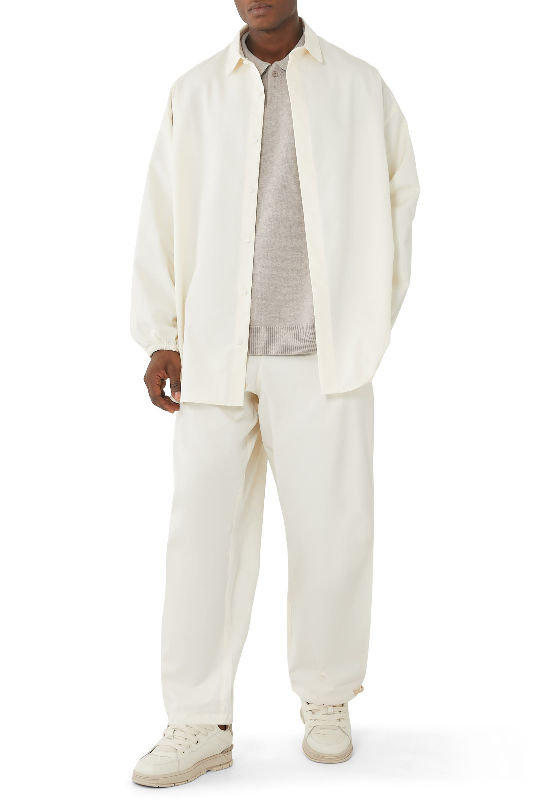 كنزة بولو منسوجة بشعار اسنشالز