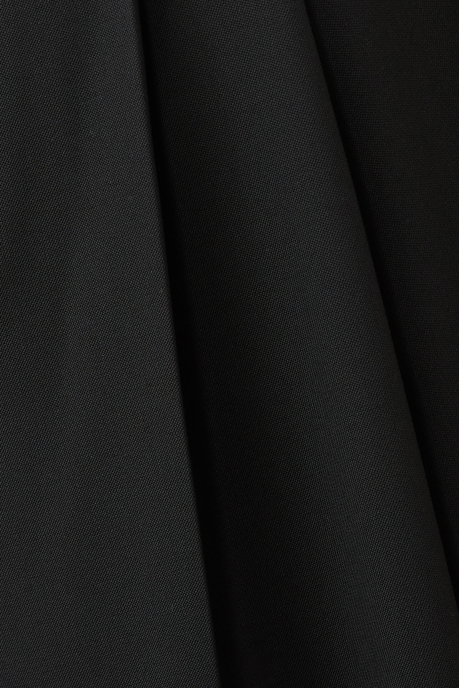 بنطال بقصة ساق واسعة وطيات