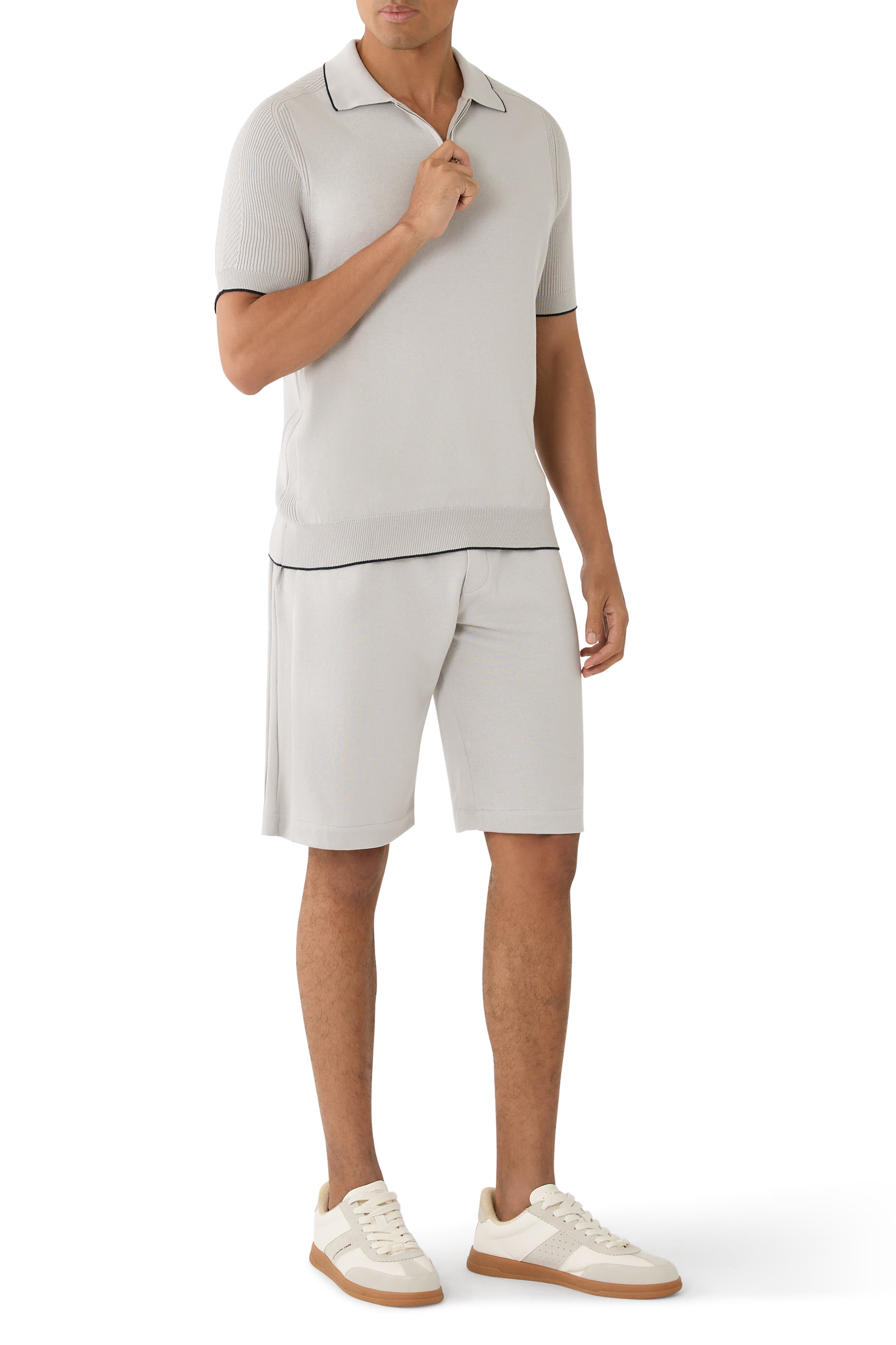 قميص بولو منسوج بسحاب