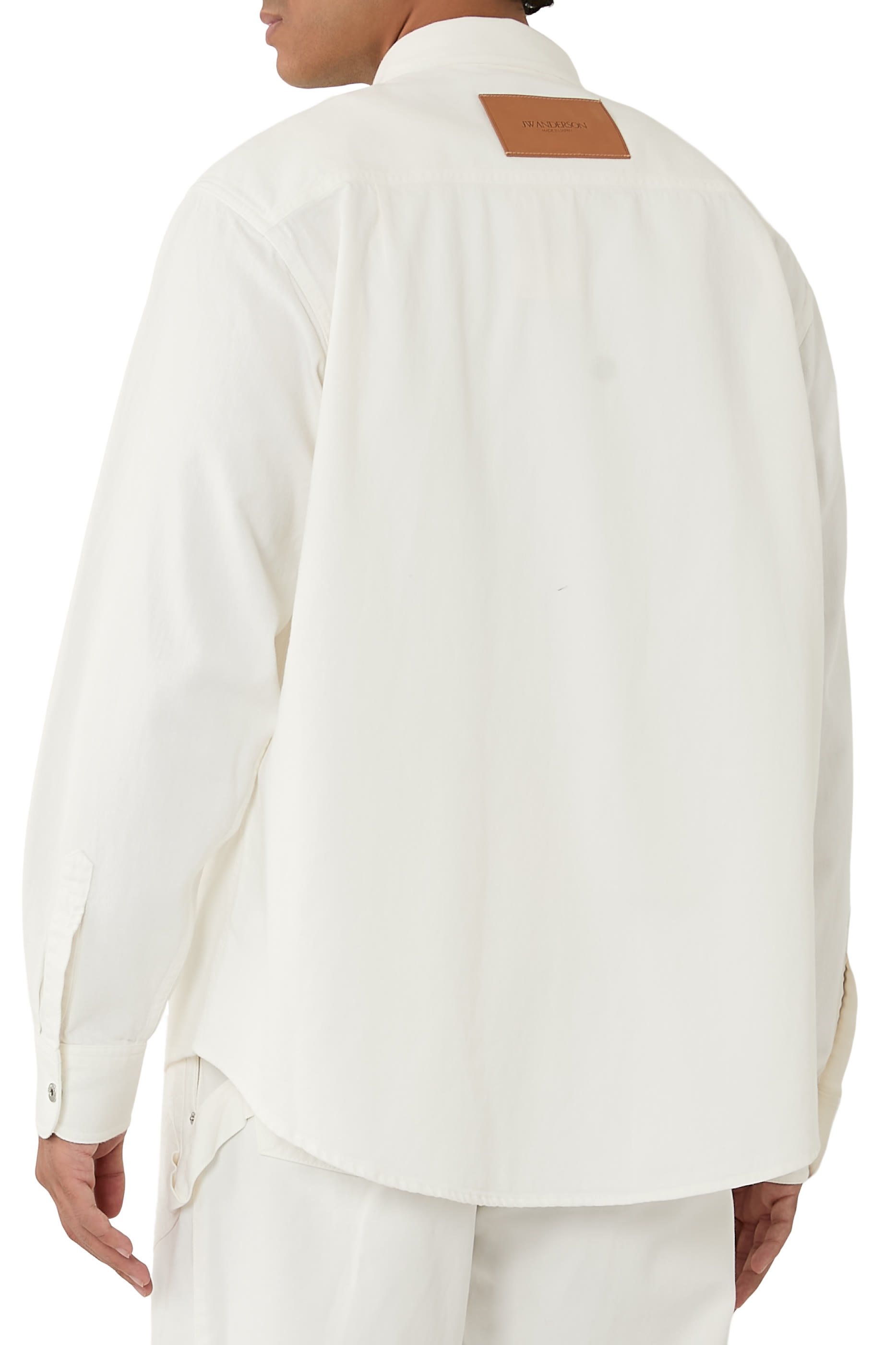 قميص بقصة فضفاضة دنيم