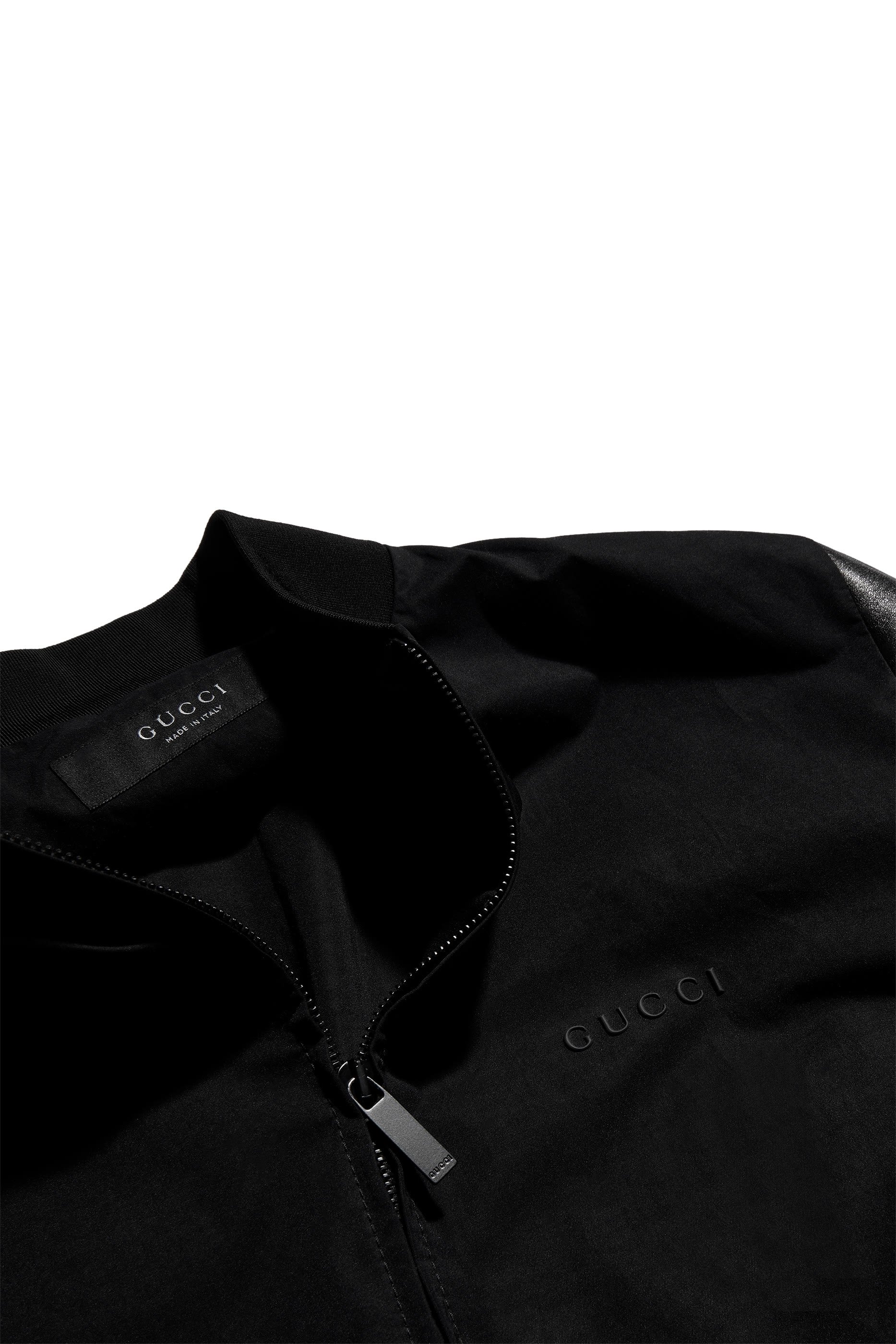  جاكيت بومبر قماش بأكمام جلد نابا