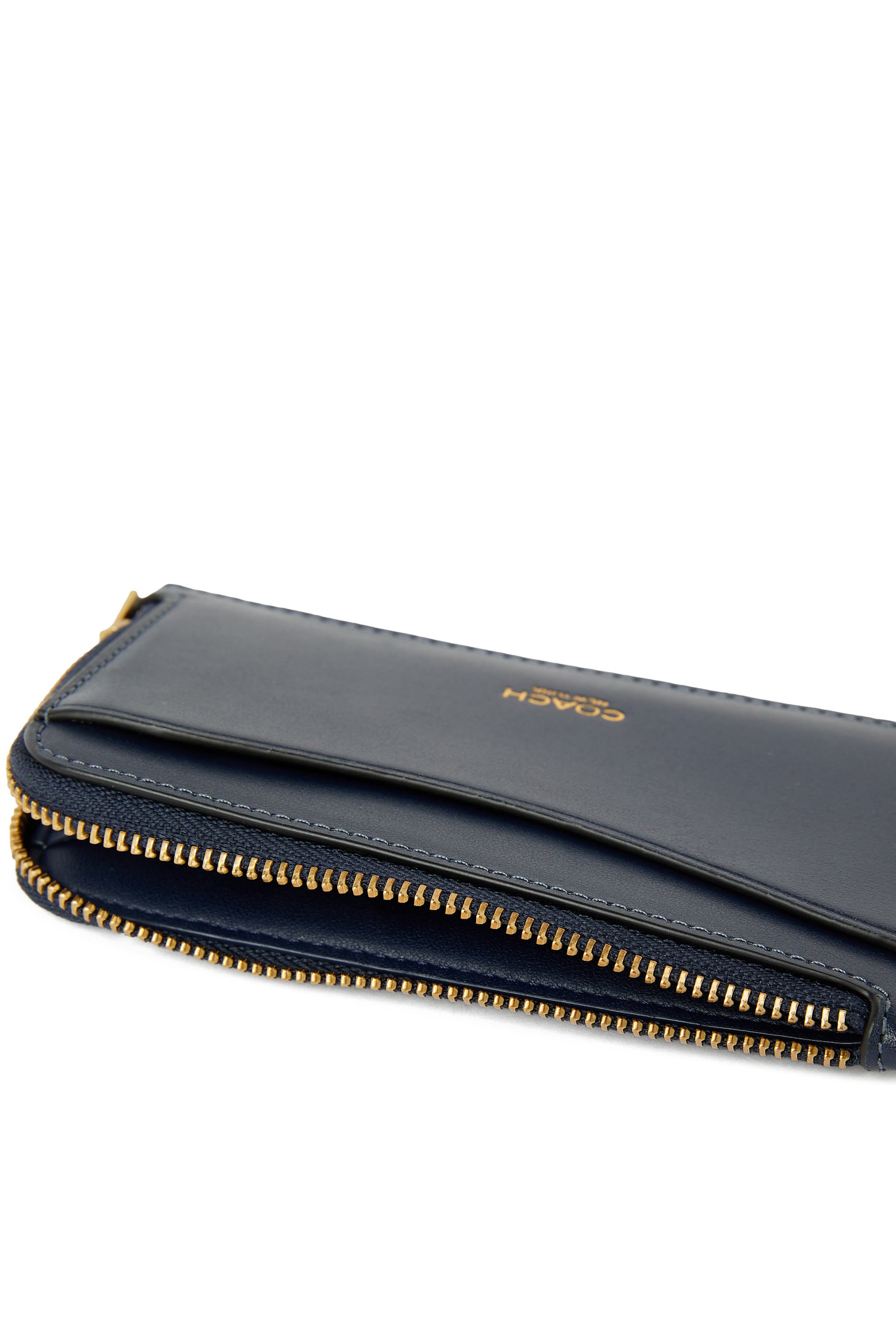 محفظة بسحاب محيط جلد