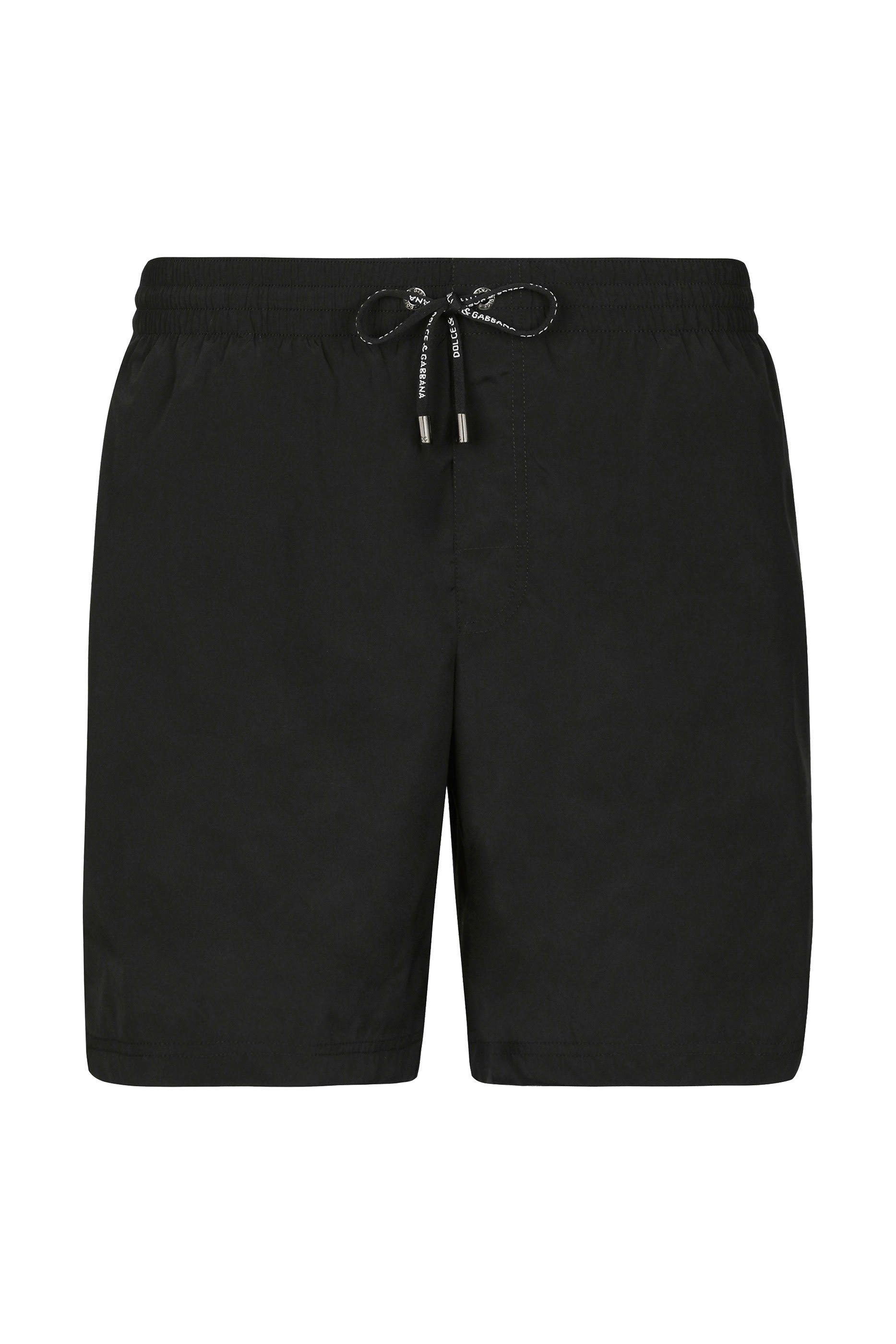 شورت سباحة بخصر متوسط الارتفاع بشعار حرفي الماركة