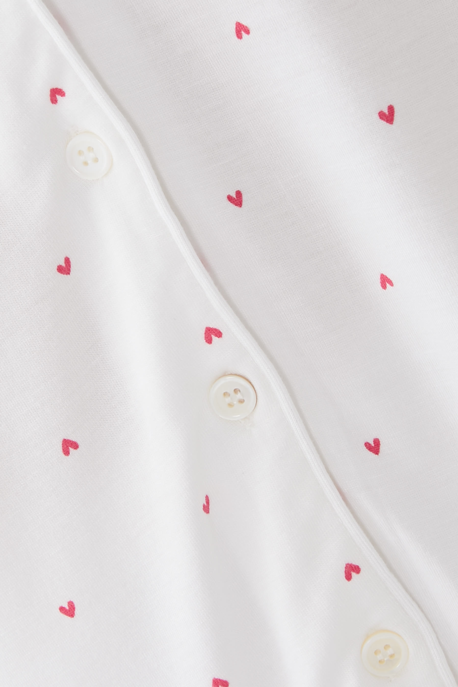 طقم بيجام قصيرة بطبعة قلوب جرسيه