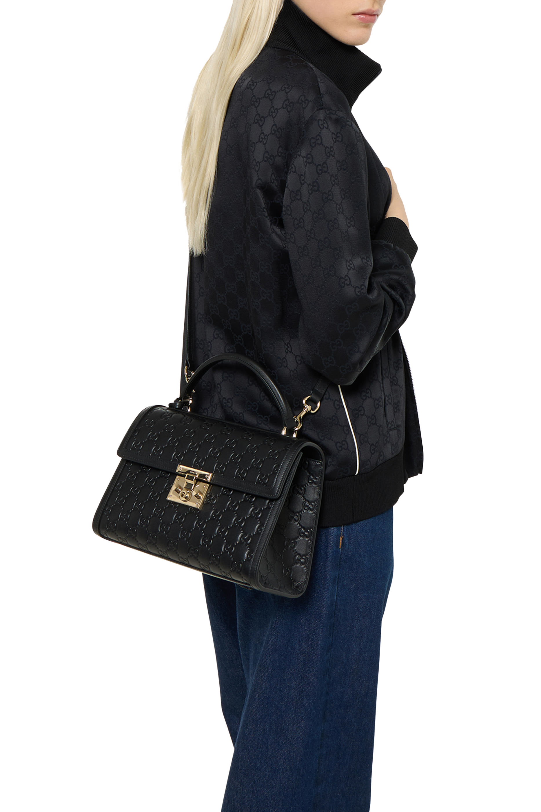 حقيبة متوسطة بيد علوية وقفل