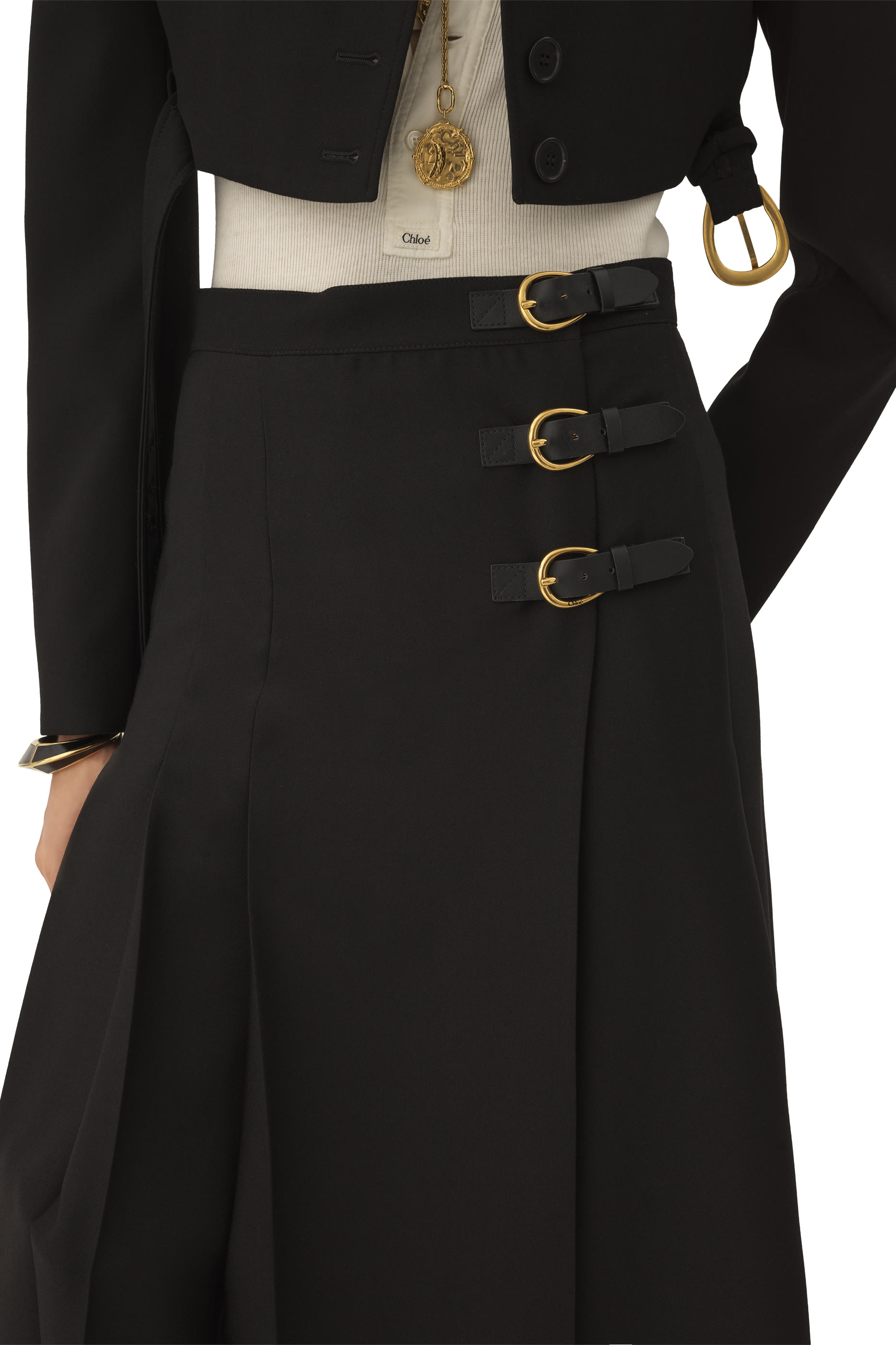 تنورة متوسطة الطول بطيات وأشرطة جلد بمشابك