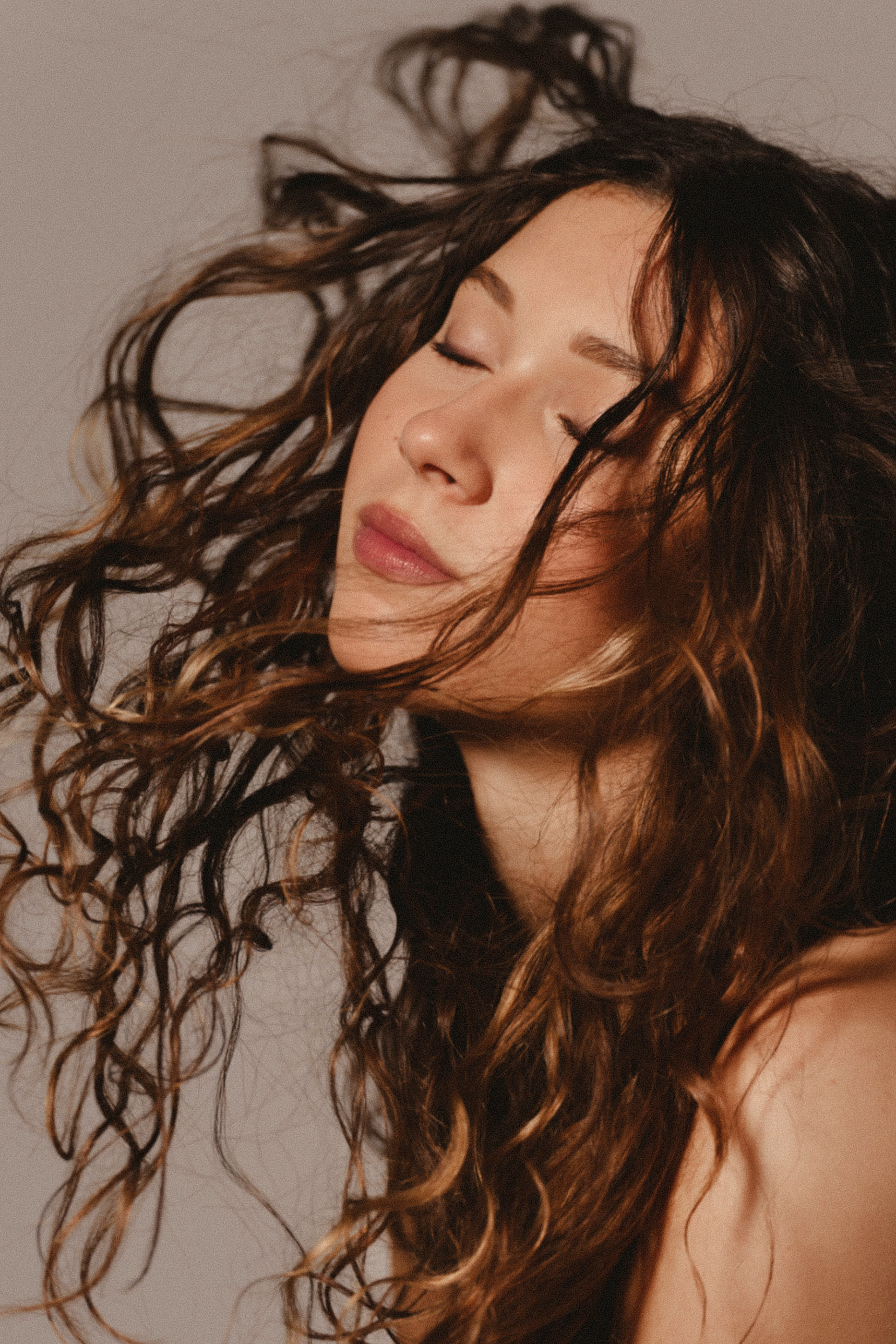 كريم لتصفيف الشعر المجعد