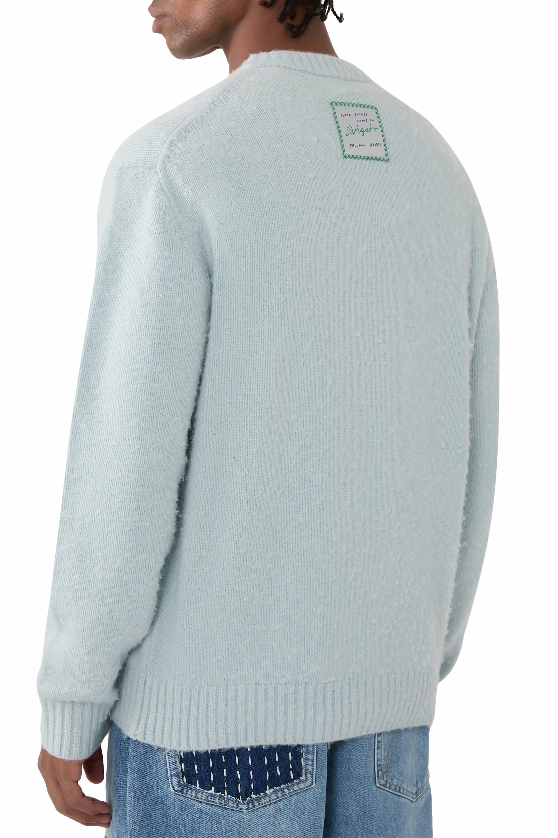 كنزة برقعة شعار الماركة