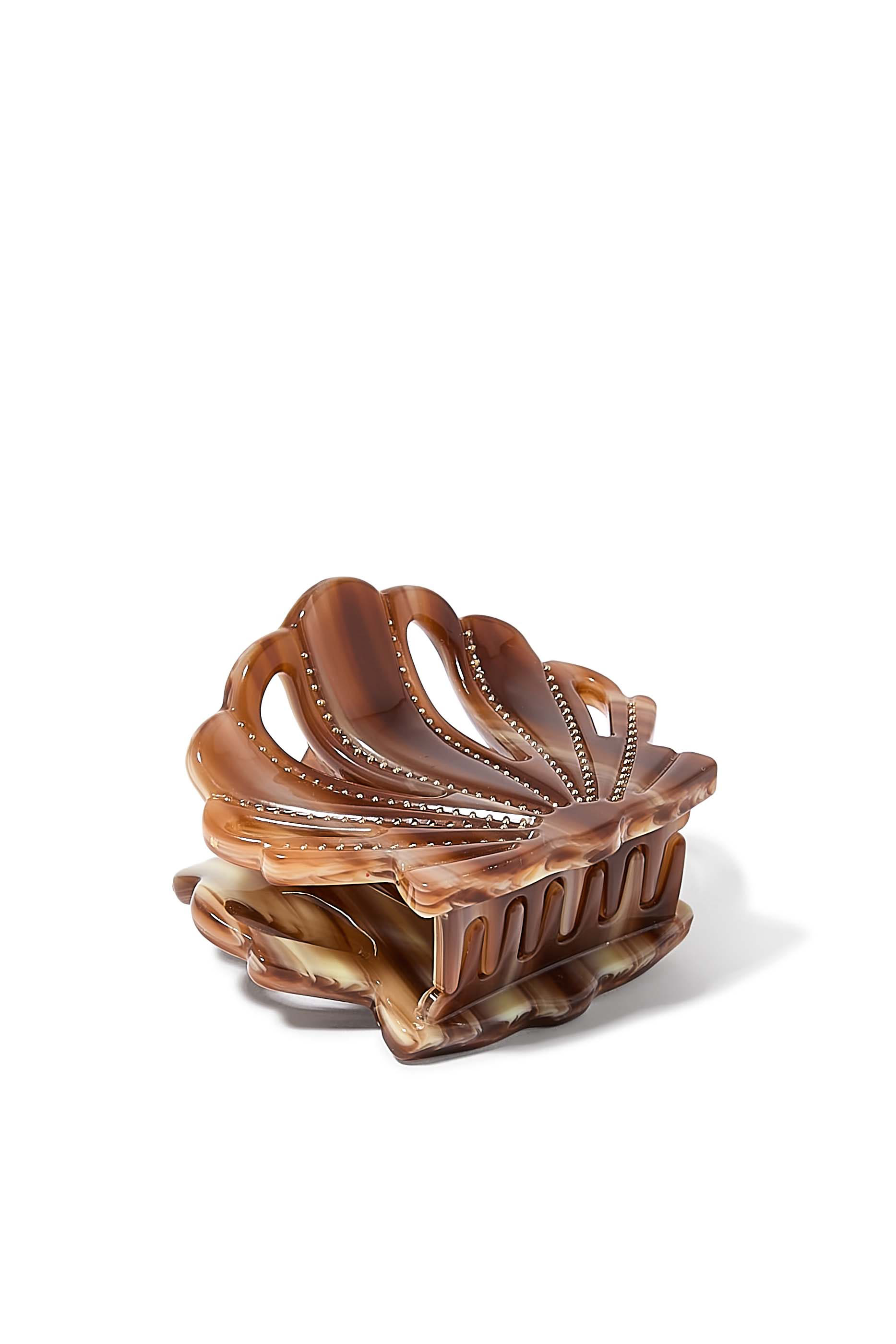 مشبك شعر بتصميم صدفة