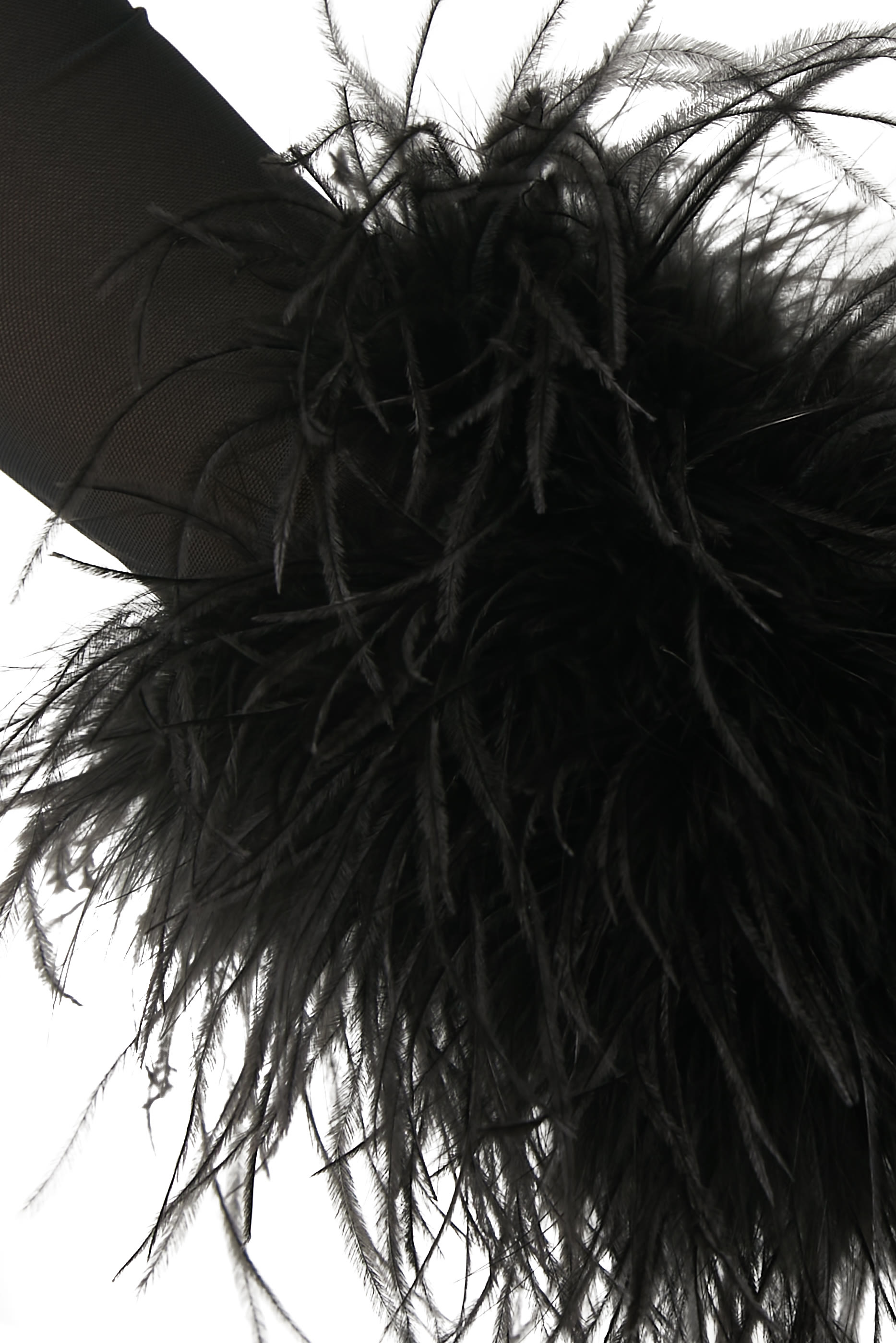 بلوزة مزينة بحواف ريش