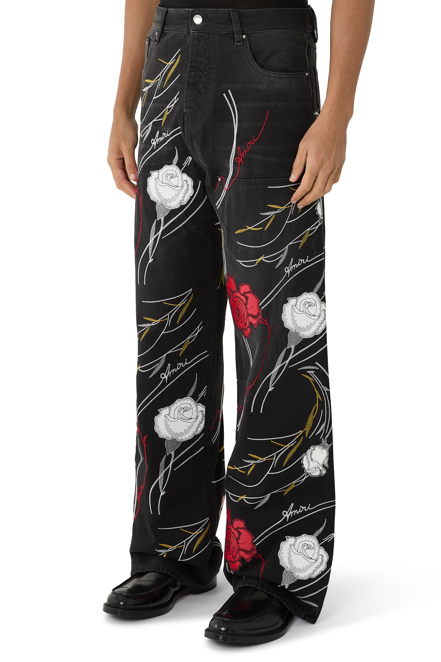 بنطال جينز فضفاض بتطريز أزهار