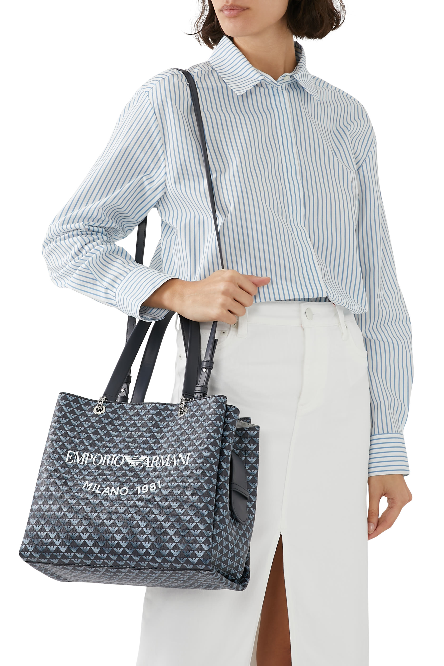 حقيبة يد مزينة كليا بنقشة شعار الماركة وحلية النسر