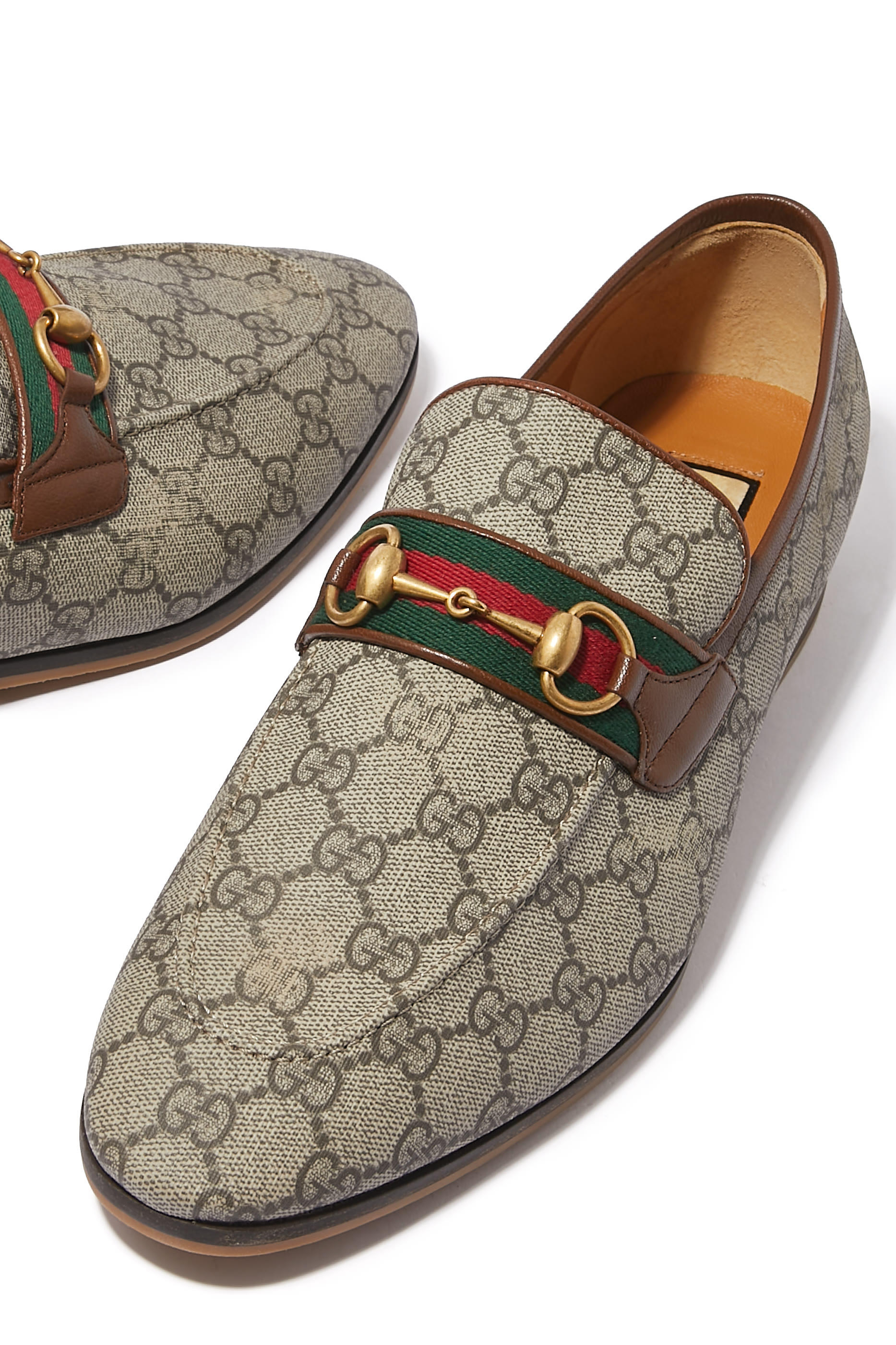 حذاء سهل الإرتداء بنقشة حرفي الماركة سوبريم بشعار اللجام