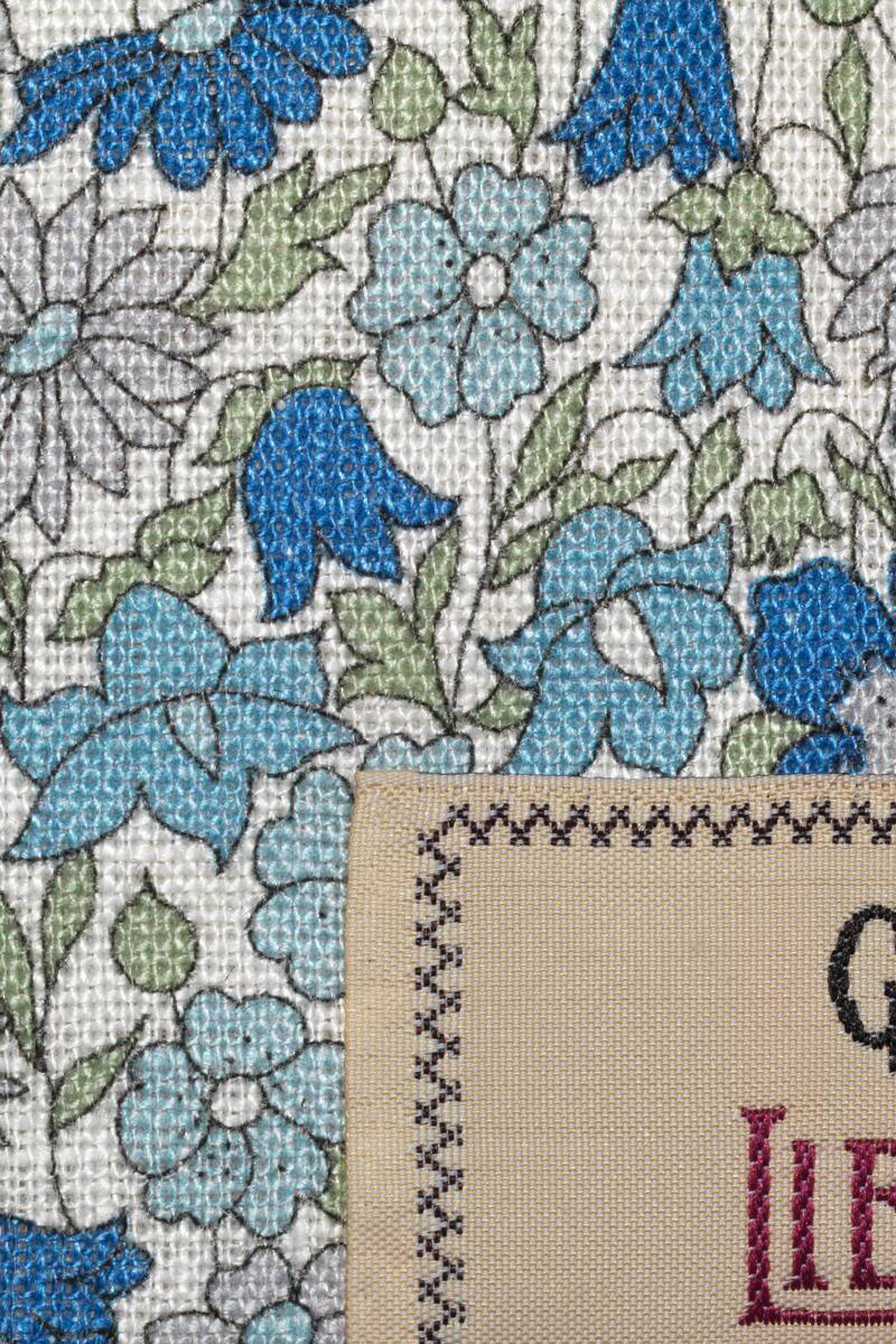 معطف بنقشة زهور وشعار Gucci Liberty