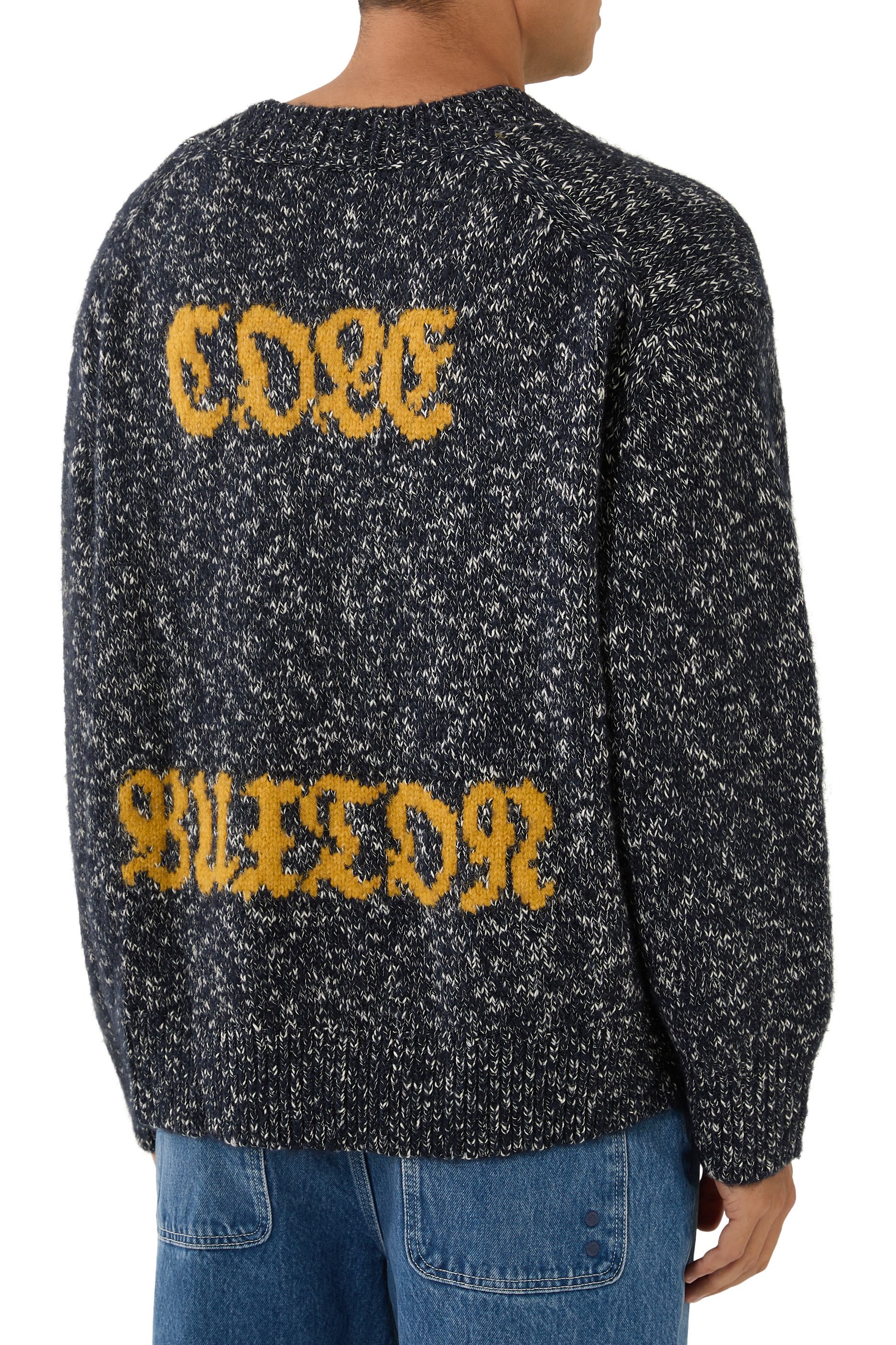 كنزة منسوجة مزينة بنجمة