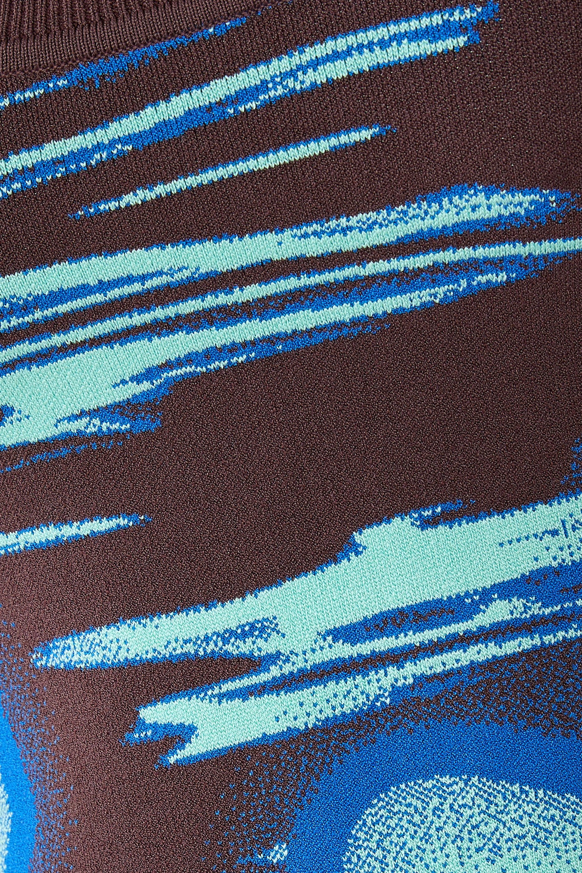 بلوزة كيري بلا أكمام بحافة مموجة