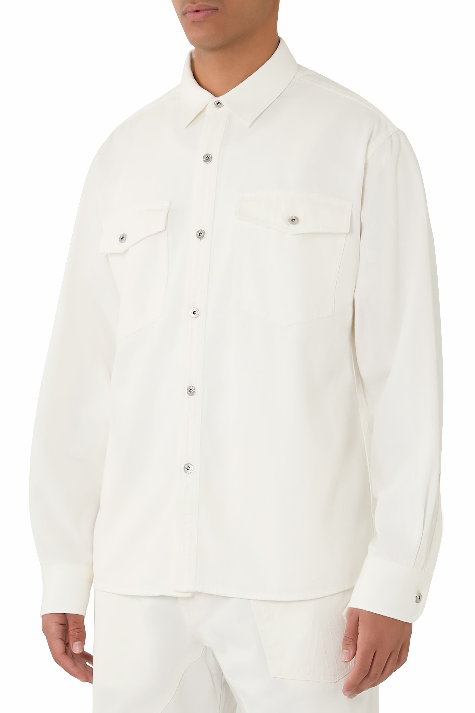 قميص بقصة فضفاضة دنيم