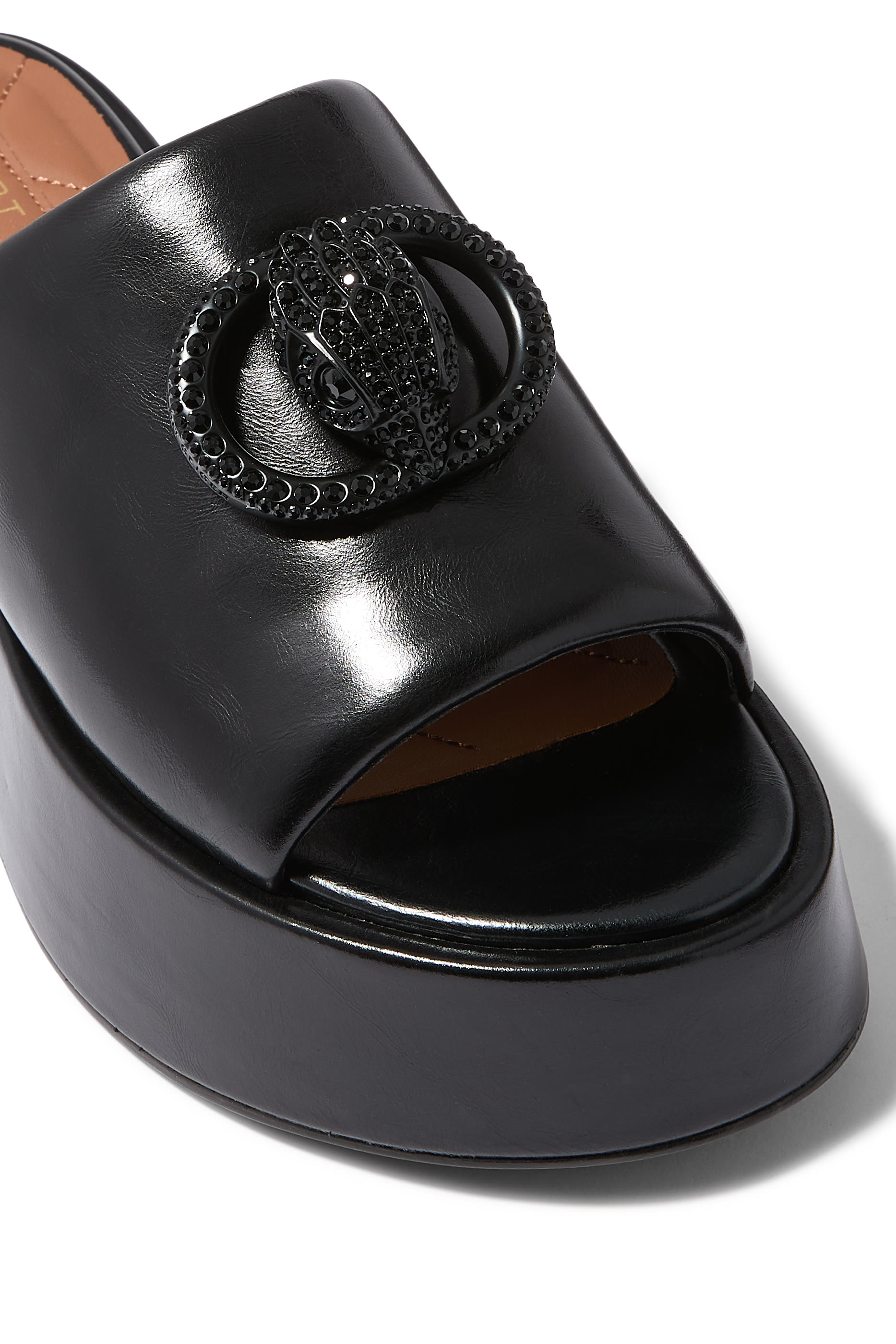 حذاء تشيلسيا درنش 55 بنعل عريض مفتوح من الخلف 