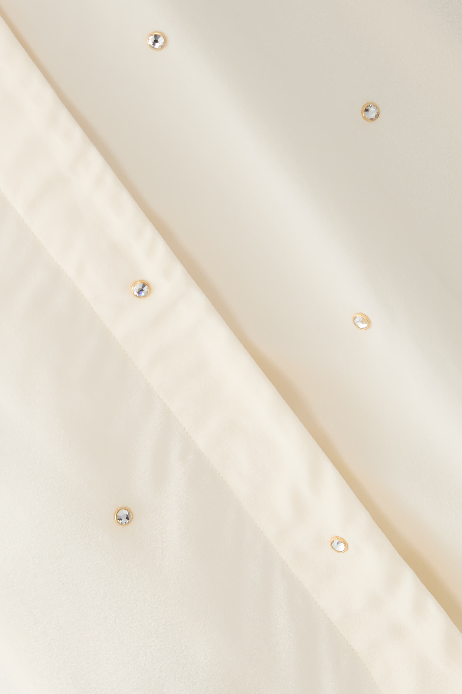 قميص بقصة فضفاضة مطرز بالكريستال