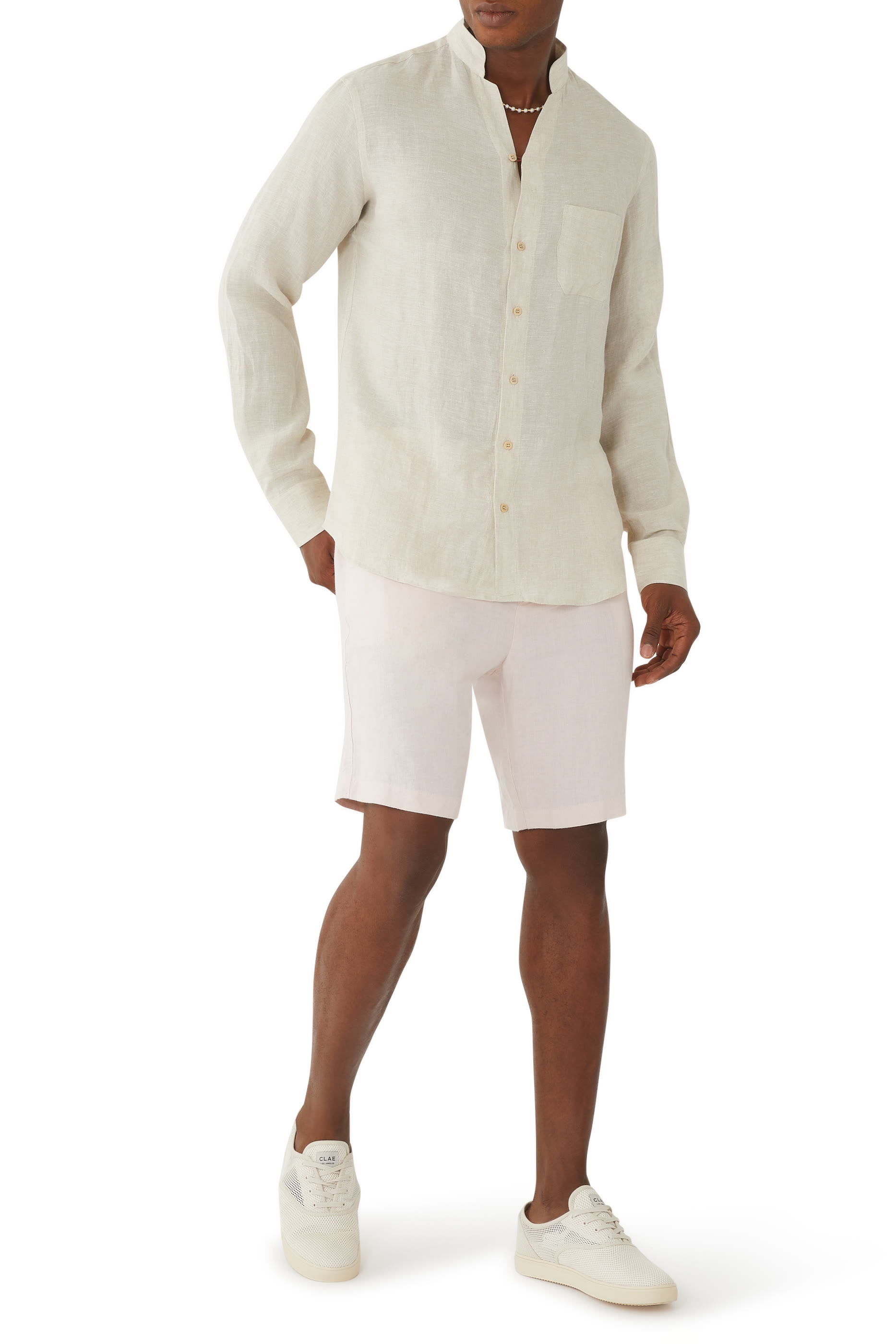 قميص بحافة مقوسة