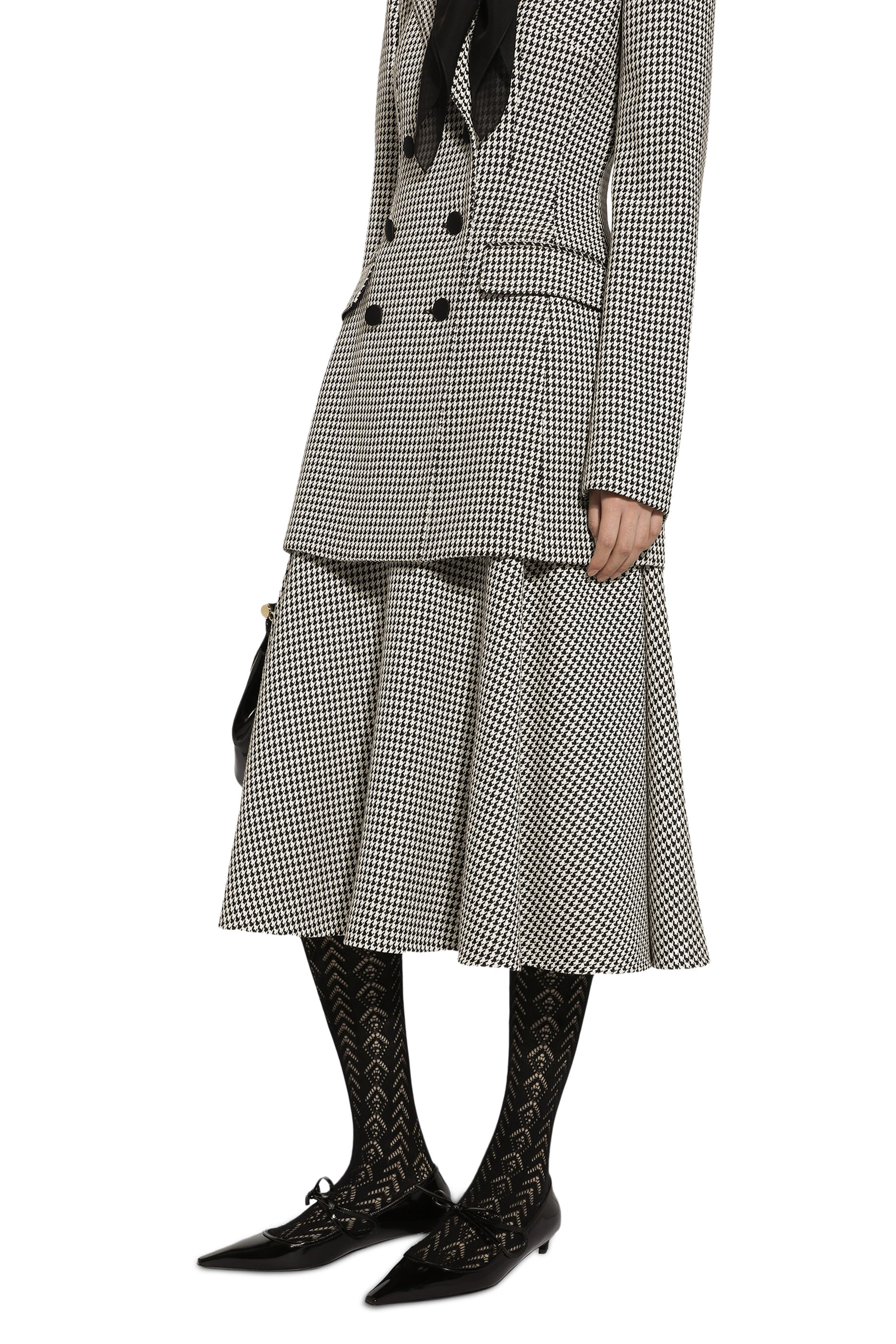 تنورة بقصة دائرية متوسطة الطول ونقشة هاوندزتوث صوف