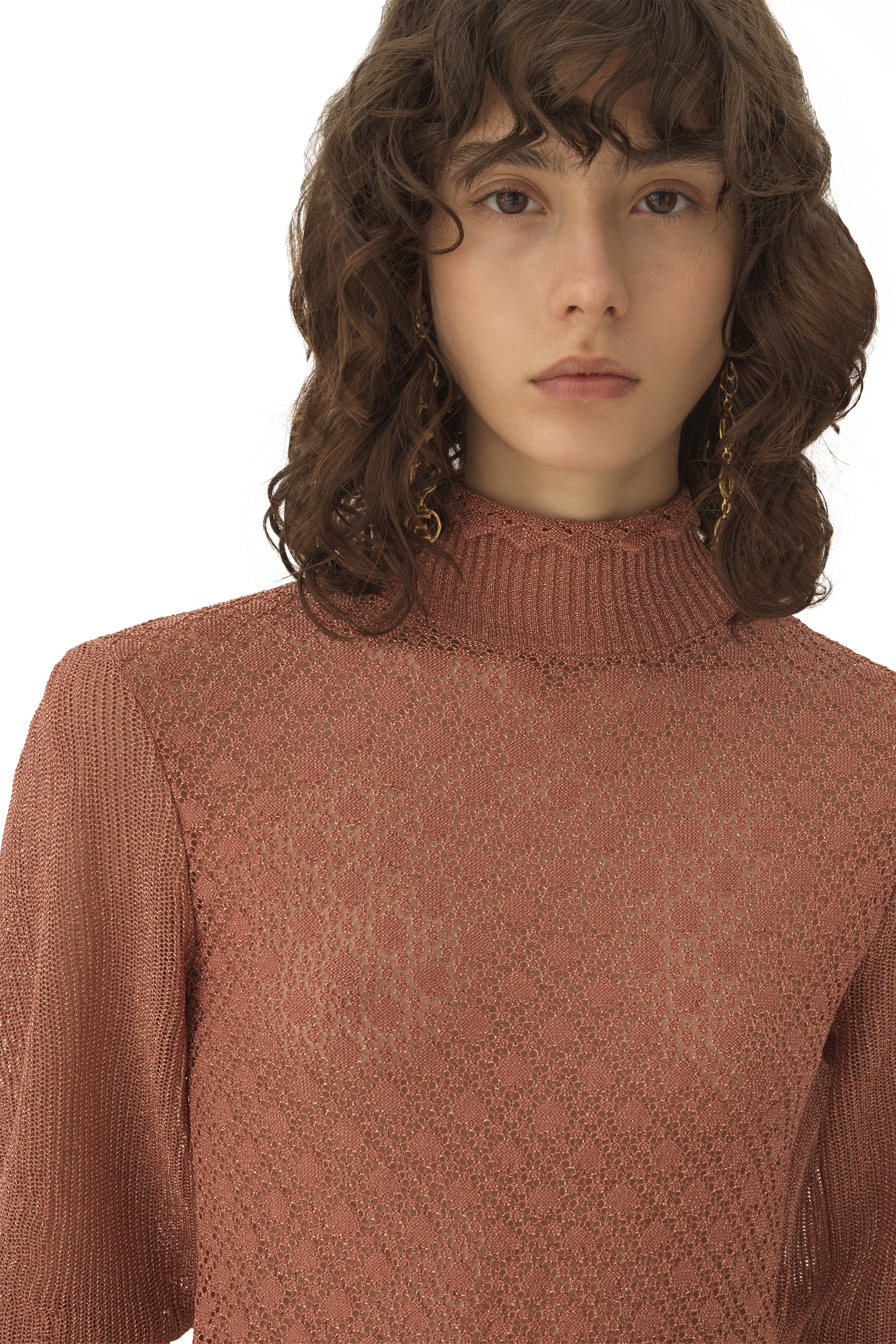 كنزة بأكمام منفوخة وكشكش