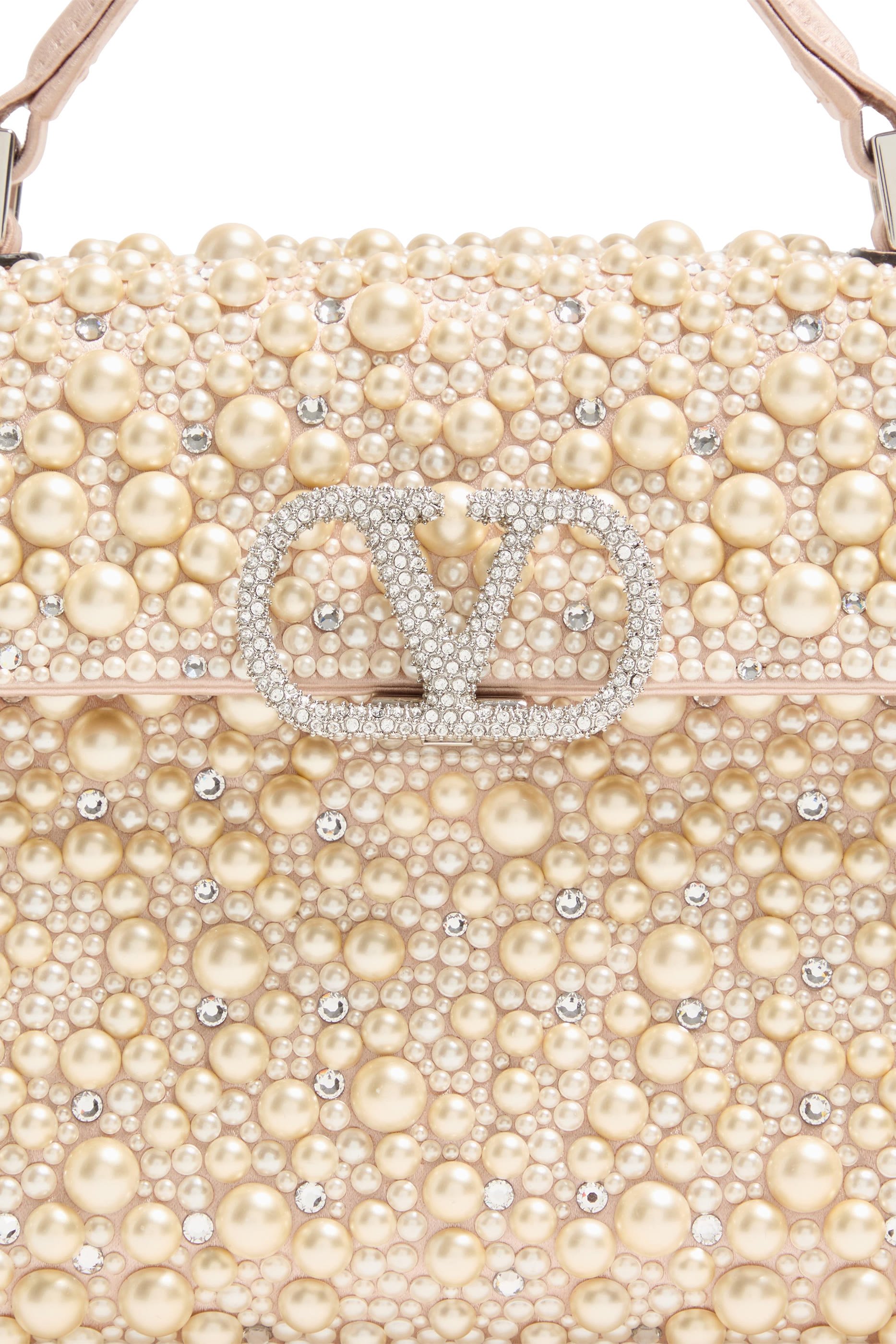 حقيبة يد بتطريزات لامعة وسلسلة