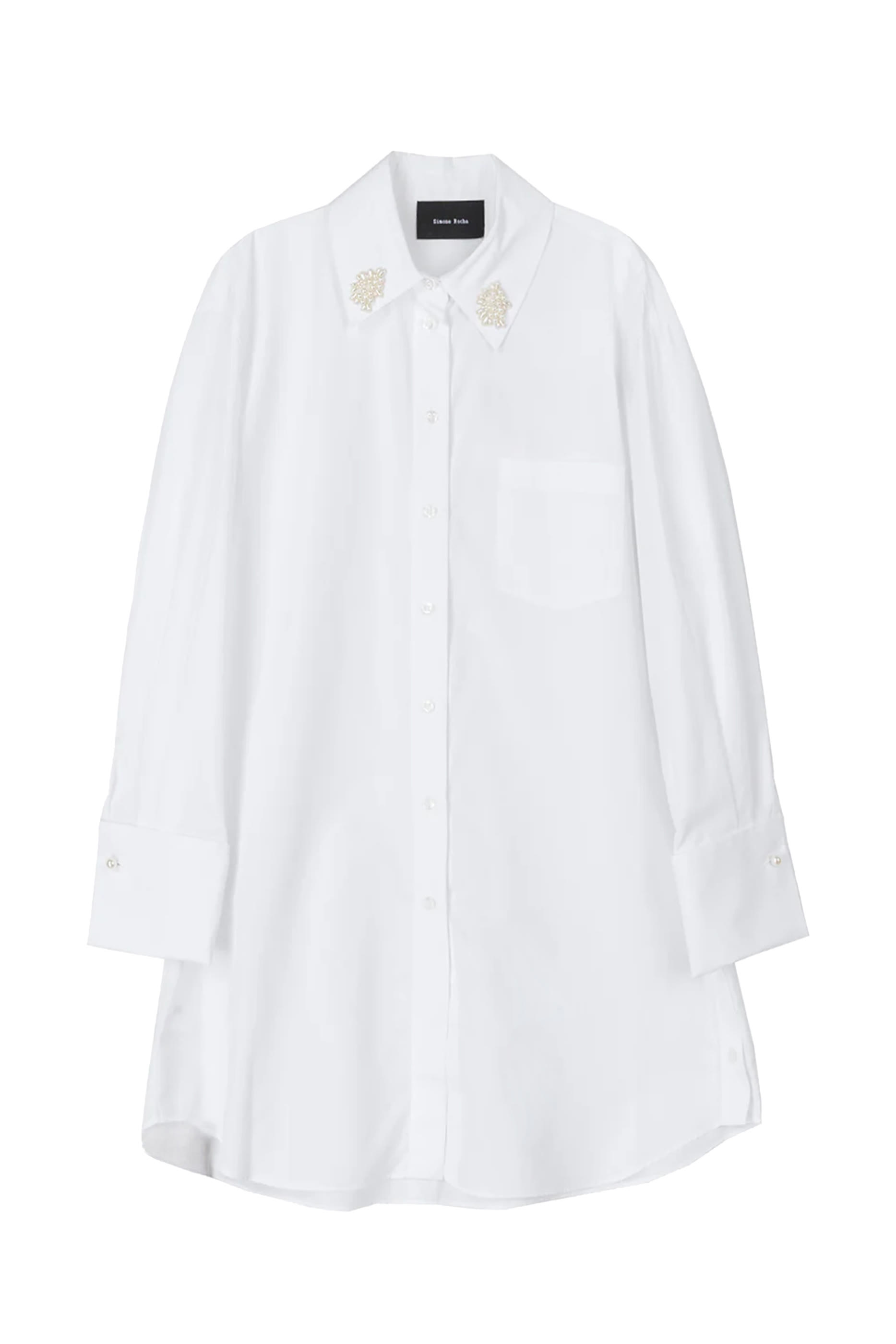 قميص بأزرار وأساور طويلة